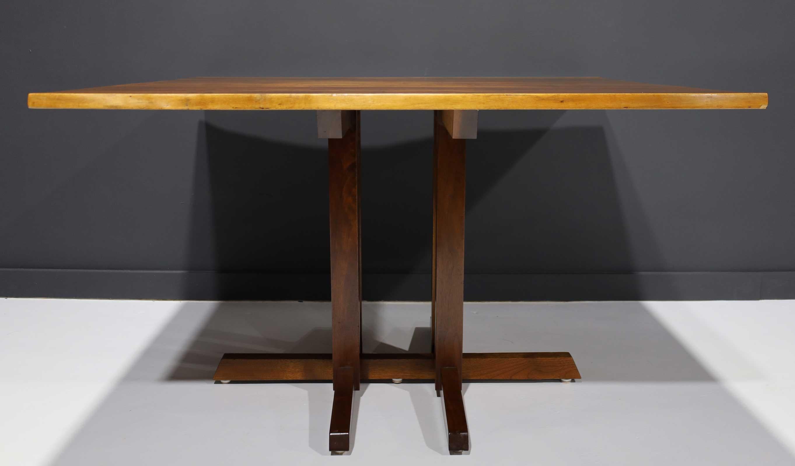 A black walnut Frenchman's Cove dining table with free edge dtd. 1964. Authentication and original paperwork included.