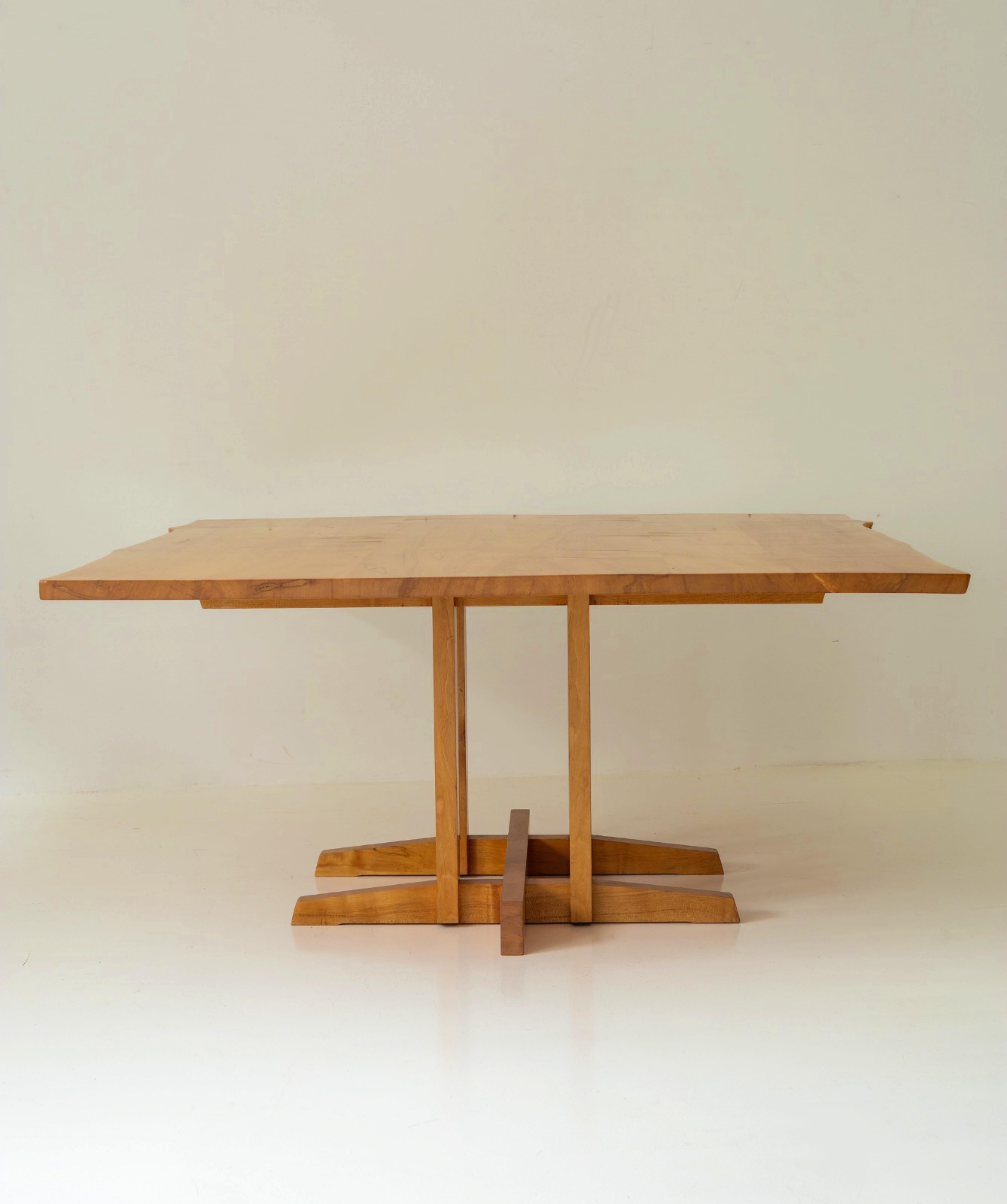 A rare Frenchman's Cove dining table, in maple wood with free-edge top, made by George Nakashima in 1980

Height 73.5cm, the top basically 152.5cm square but slightly wider in places where the free edge protrudes.  In very good condition, with