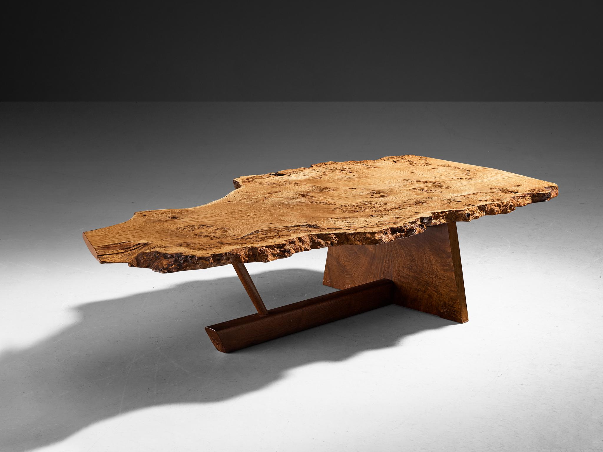George Nakashima, 'Minguren II' coffee table, English oak burl, oak, American black walnut, United States, 1980 

American woodworker and designer George Nakashima proves with this quintessential table that he is a true master of his craft. The