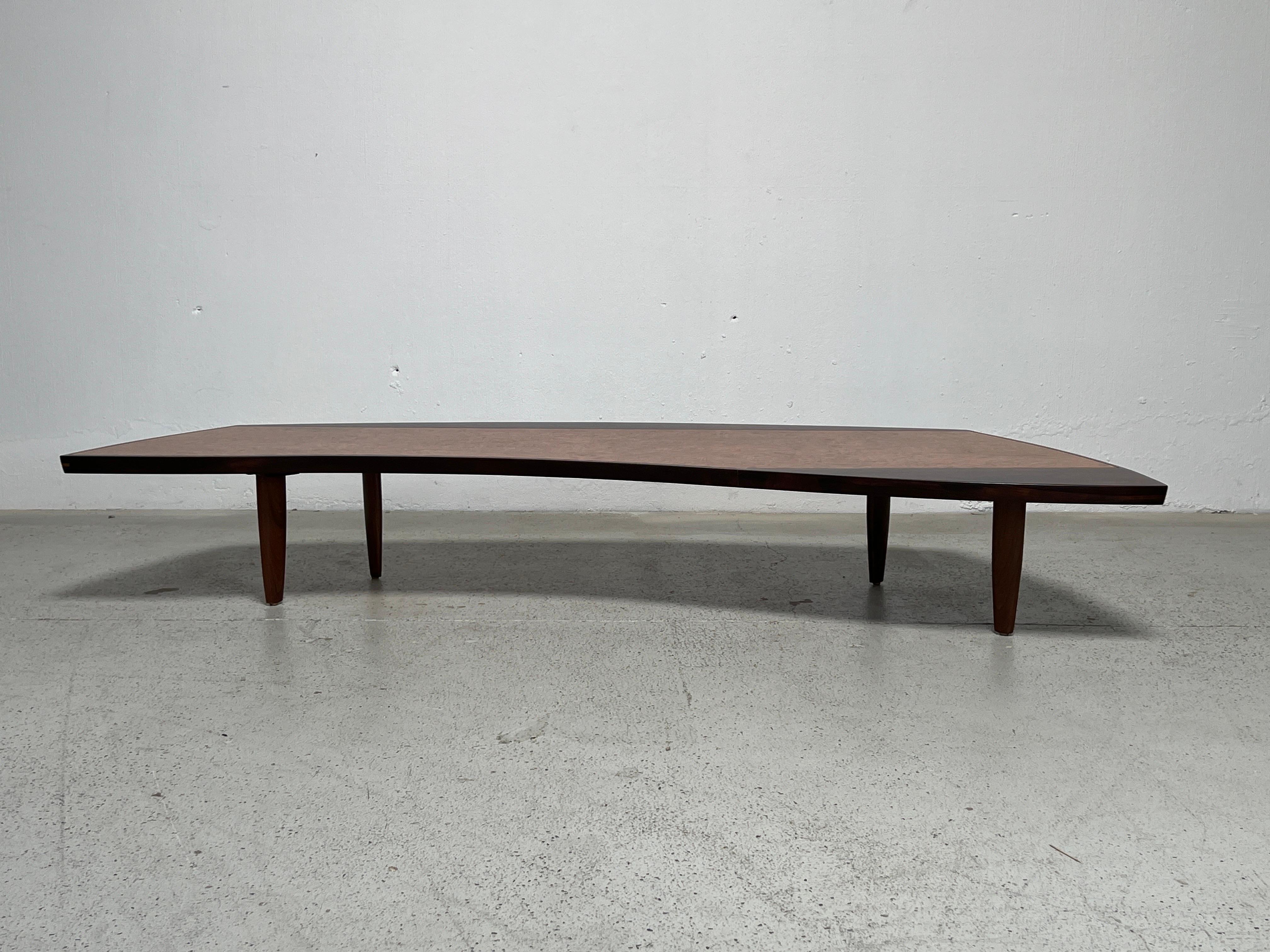 A George Nakashima coffee table model 200-84W in walnut, carpathian elm and rosewood designed for Widdicomb. Beautifully restored. 