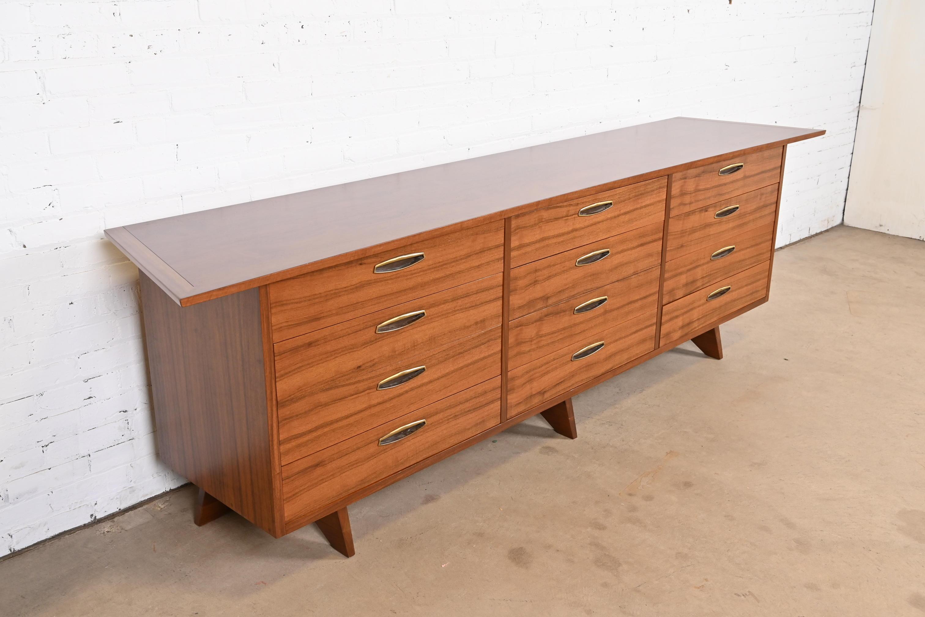 A very rare and exceptional mid-century Organic Modern monumental triple dresser, sideboard, or credenza

By George Nakashima for Widdicomb Furniture, 