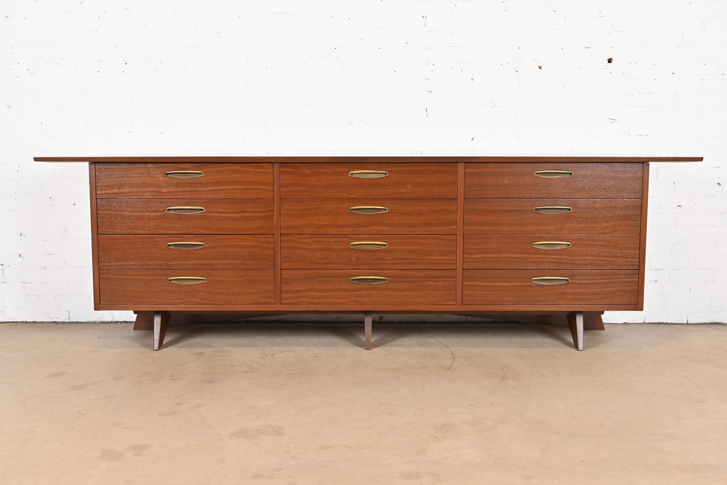 A very rare and exceptional mid-century Organic Modern monumental triple dresser, sideboard, or credenza

By George Nakashima for Widdicomb Furniture, 