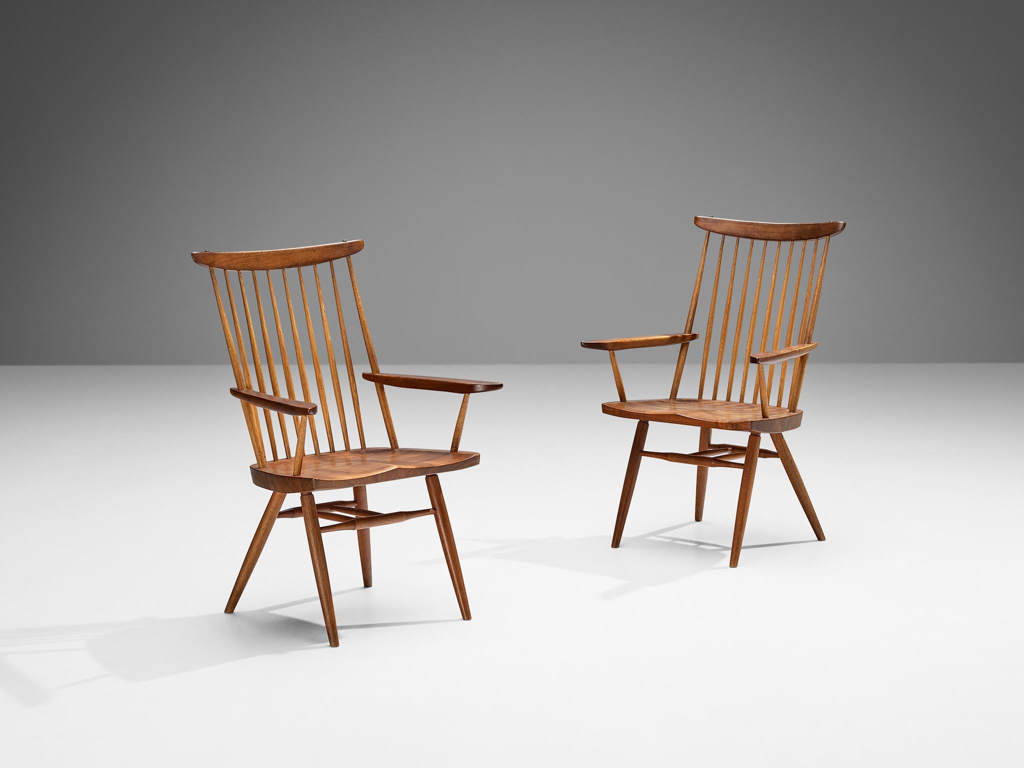 George Nakashima for Nakashima Studio, pair of ‘New’ armchairs, walnut, hickory, United States, 1960 

With regard to its essential form, material use, and woodwork, this ‘New’ armchair is a testimony to George Nakashima's expert craftsmanship and