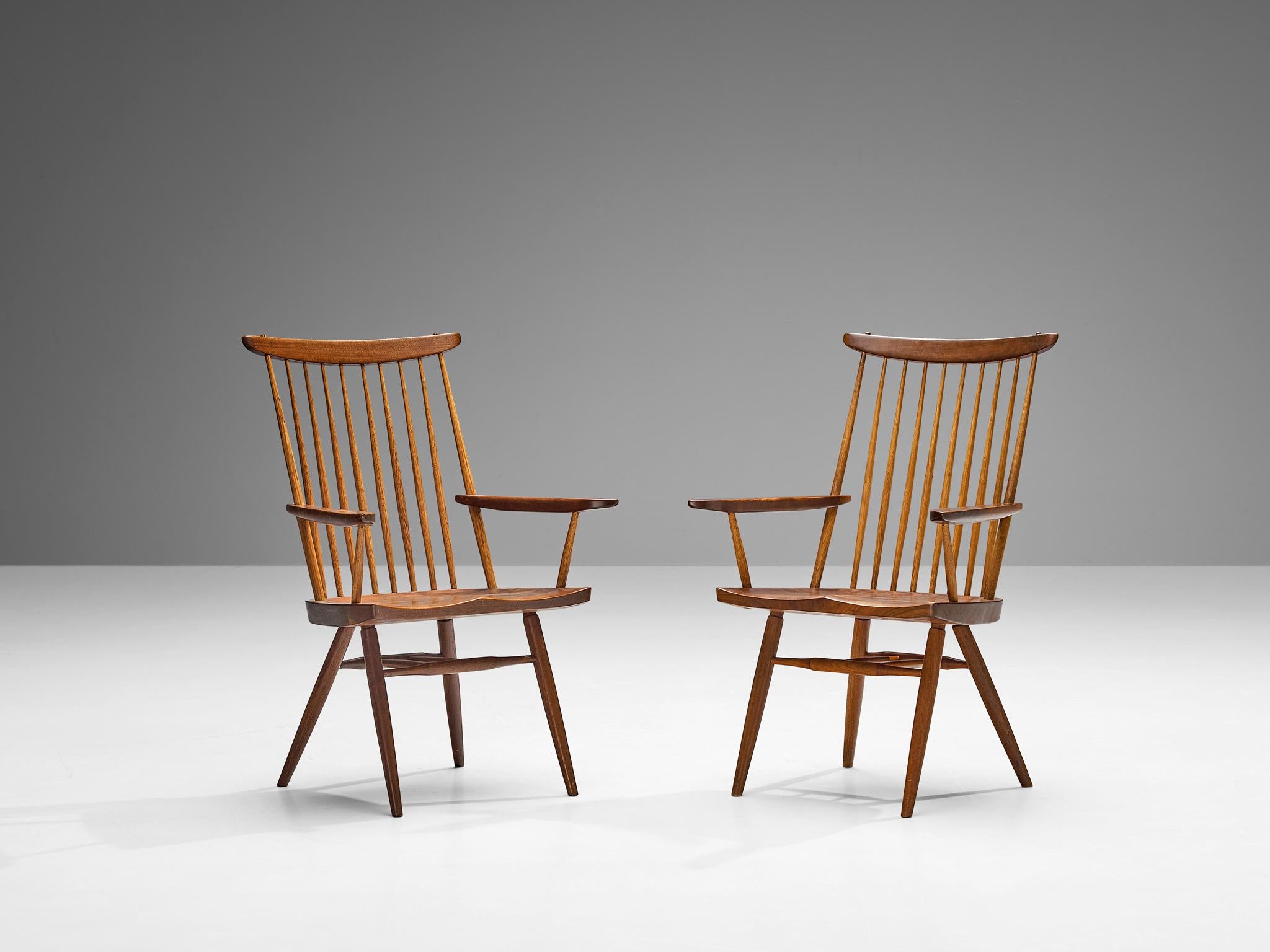 George Nakashima für Nakashima Studio, &New' Sessel, Nussbaum, Hickoryholz, Vereinigte Staaten, 1960 

In Bezug auf seine wesentliche Form, die Verwendung von MATERIAL und die Holzverarbeitung ist dieser 