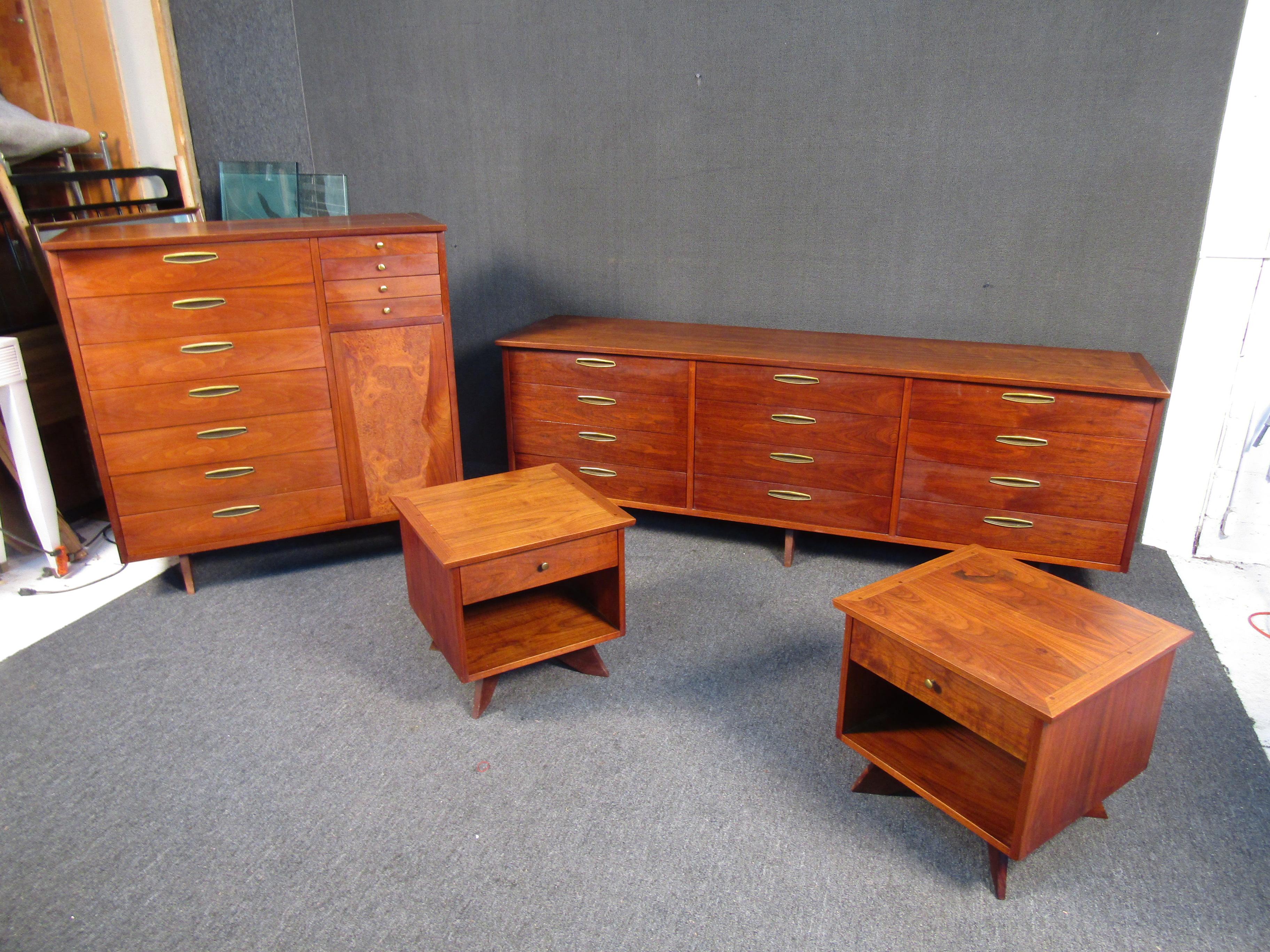 George Nakashima designed bedroom set for his Origins line by Widdicomb, Dramatic wood grain figuring throughout the body. Featuring a highboy, rare example with a figured burl door and drawers for every necessity rising on a splayed base.