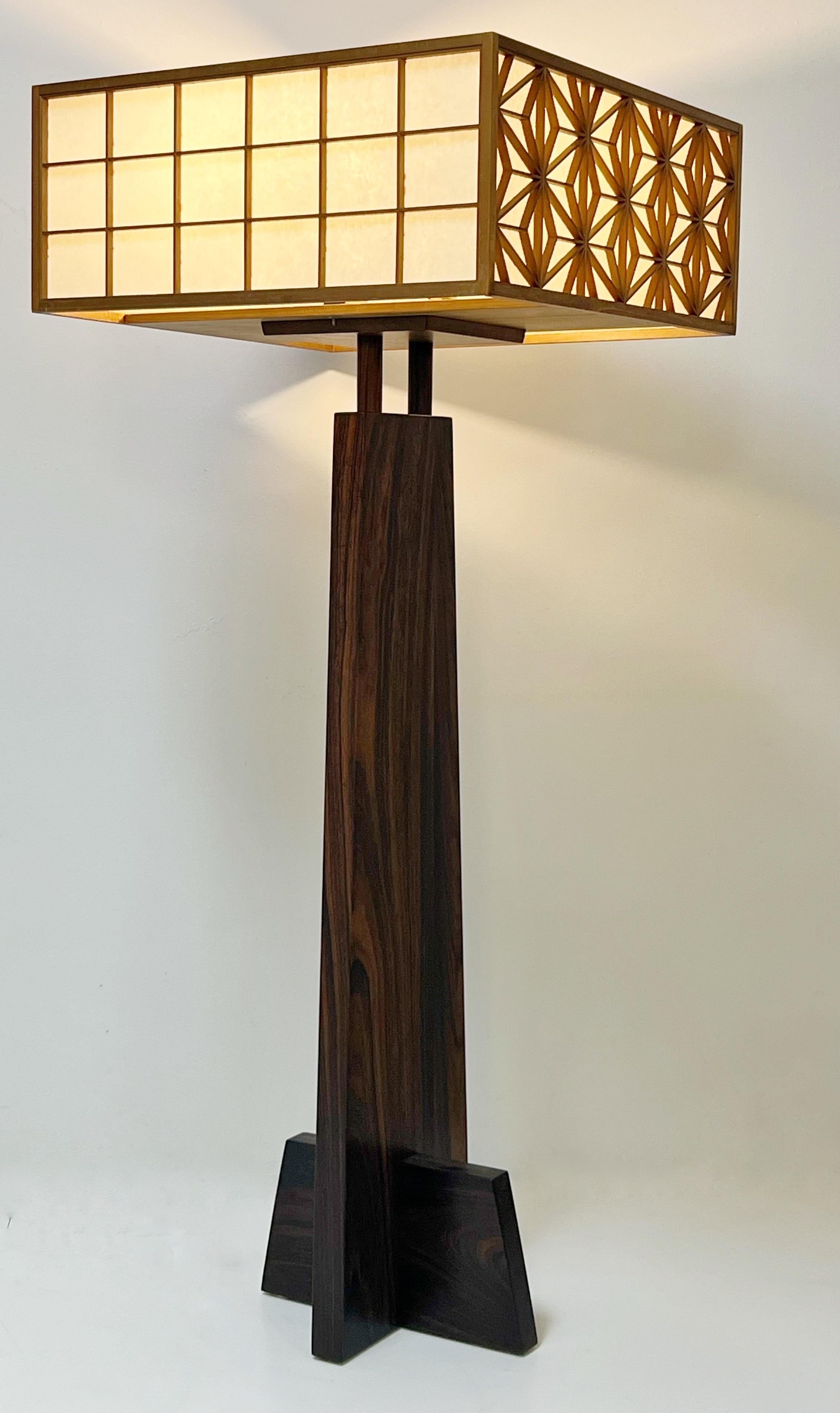 A rare example of this design. The base is Rosewood with beautiful grain and color.  Shade is 24.25” square and 10” inches tall. Total height of lamp is 58.5” 
Possibly a unique specimen with the rosewood base. 
Marked with client’s name where shade