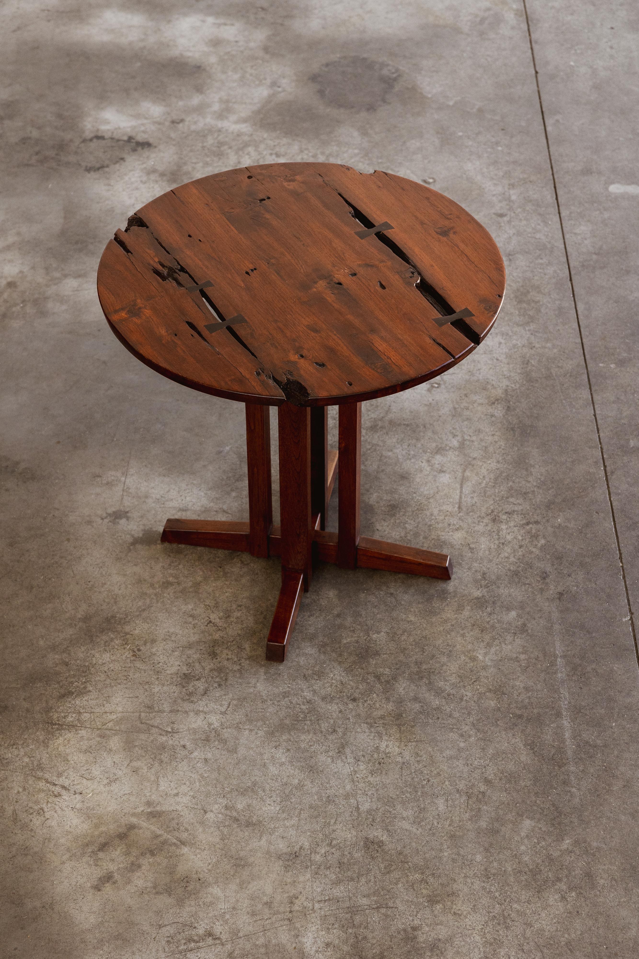 George Nakashima round cluster-base table, wood, USA, 1962

George Nakashima designed these dining chairs in 1947, embodying a fusion of traditional Japanese woodworking and modernist design. Crafted from American black walnut, they feature a low,