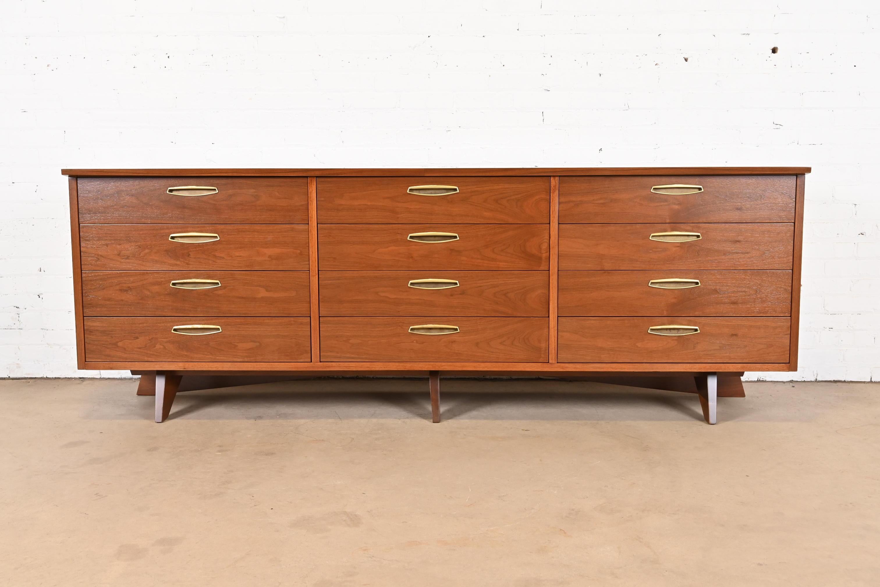 A very rare and exceptional mid-century Organic Modern monumental triple dresser, sideboard, or credenza

By George Nakashima for Widdicomb Furniture, 