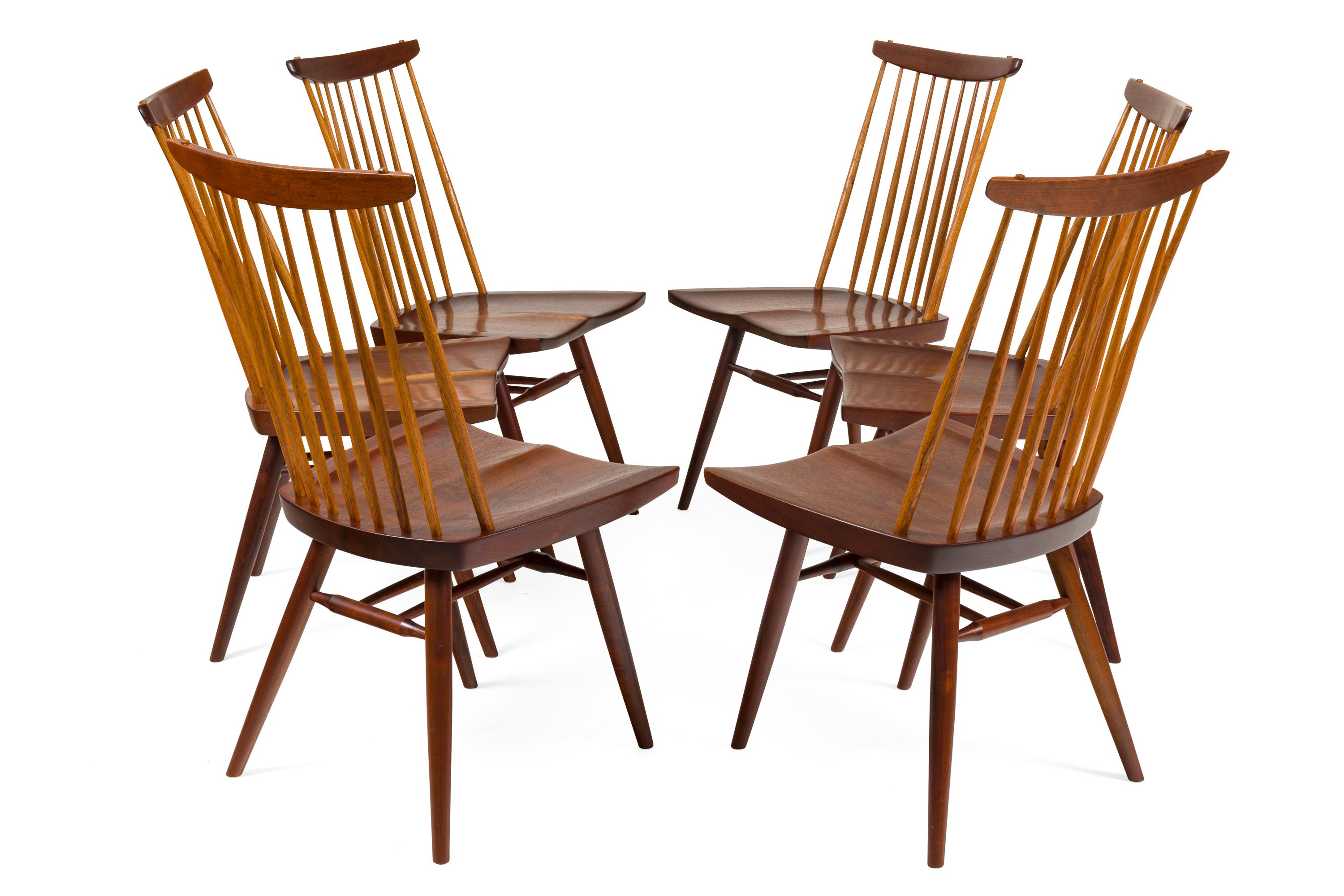 This simply elegant chair was designed in 1956 and is reminiscent of the Classic Windsor chairs of the past.