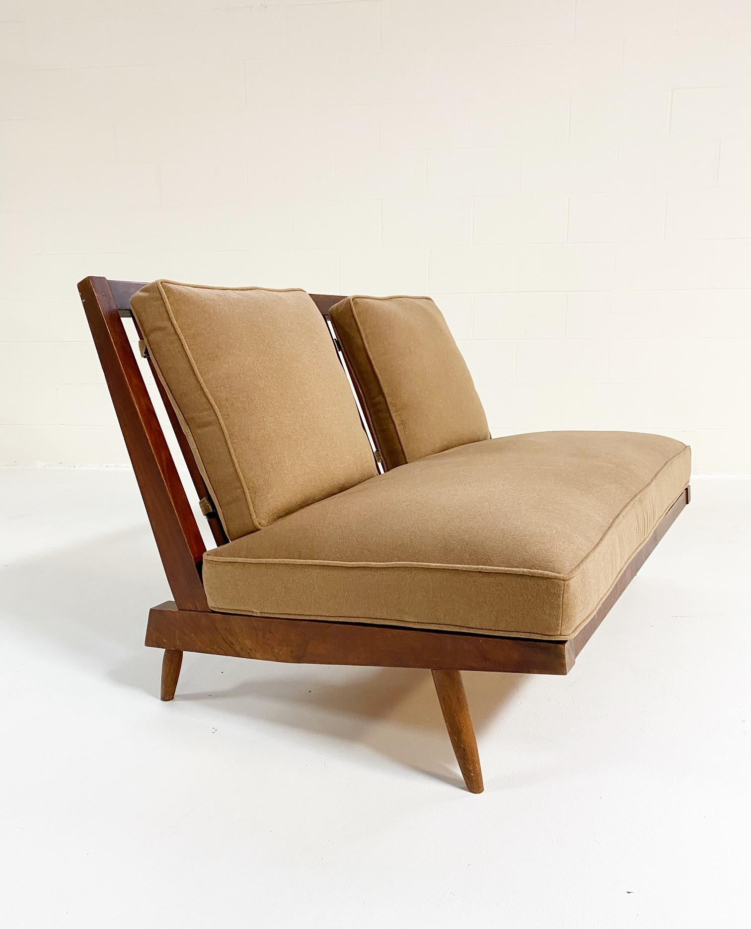 Nakashima's settee is a design lover's dream. Simple wood craftmanship at its finest. For the cushions, we chose an ultra-luxurious Loro Piana cashmere in a super chic camel hue, a perfect complement to the black walnut. From Loro Piana, 