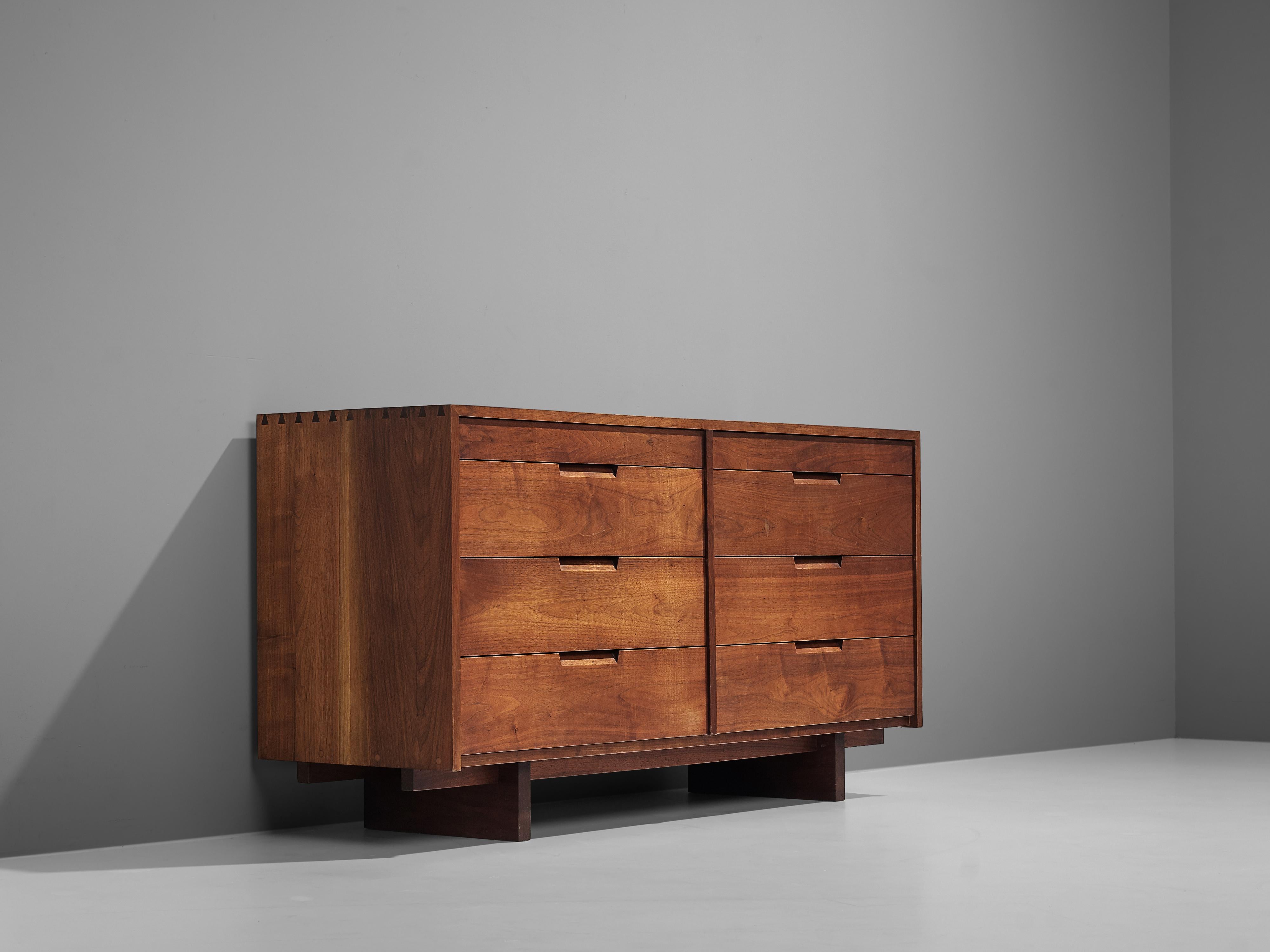 George Nakashima, cabinet, walnut, New Hope, PA, United States, 1955

This sideboard features the characteristics of Nakashima’s works who combines his great knowledge of craftsmanship with grained walnut wood and an eye for proportion. Together