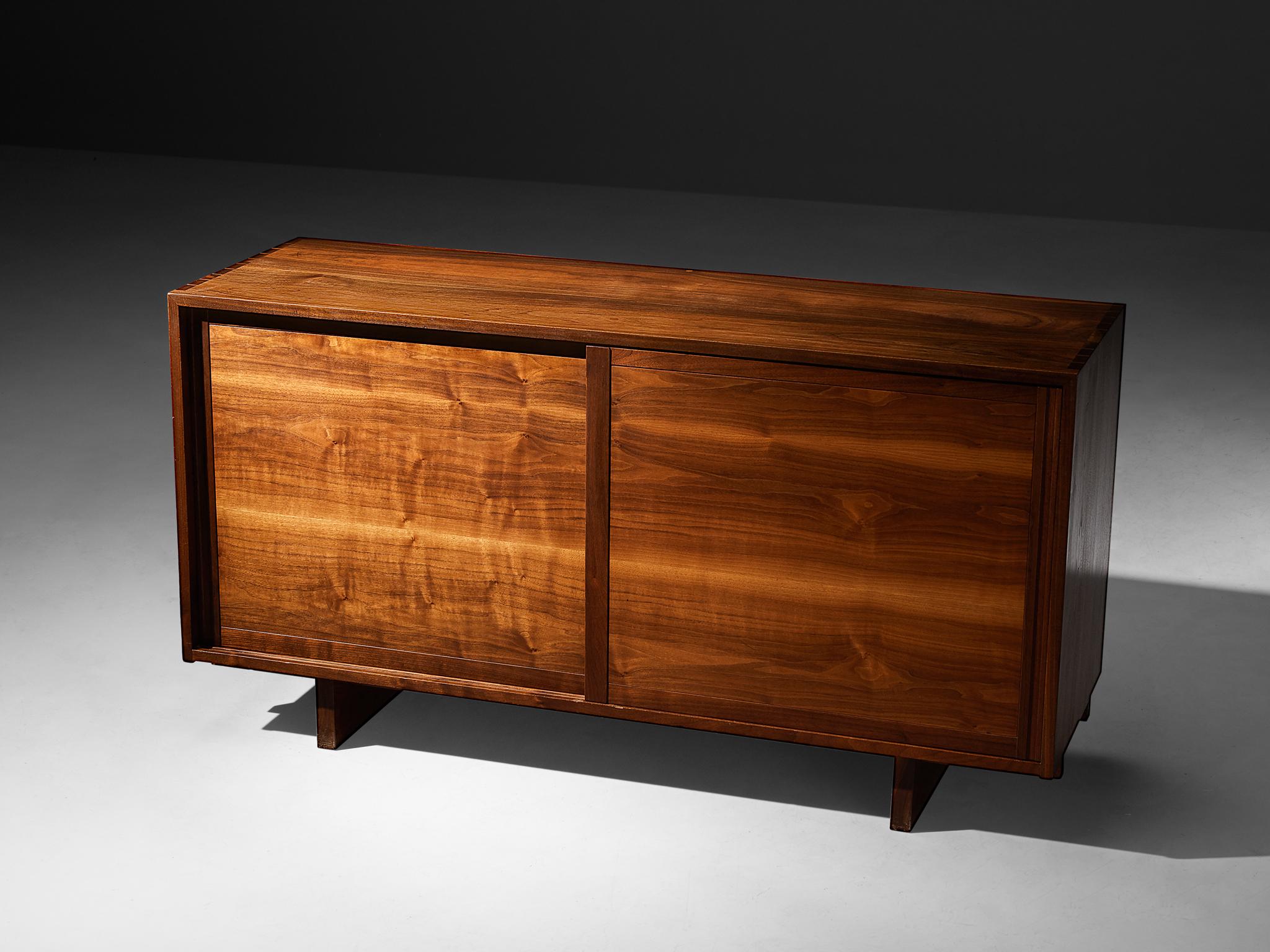 George Nakashima, sideboard with sliding doors, walnut, United States, 1956

With regard to its essential form, material use, and woodwork, this two sliding-door cabinet is a testimony to George Nakashima's expert craftsmanship and distinctive