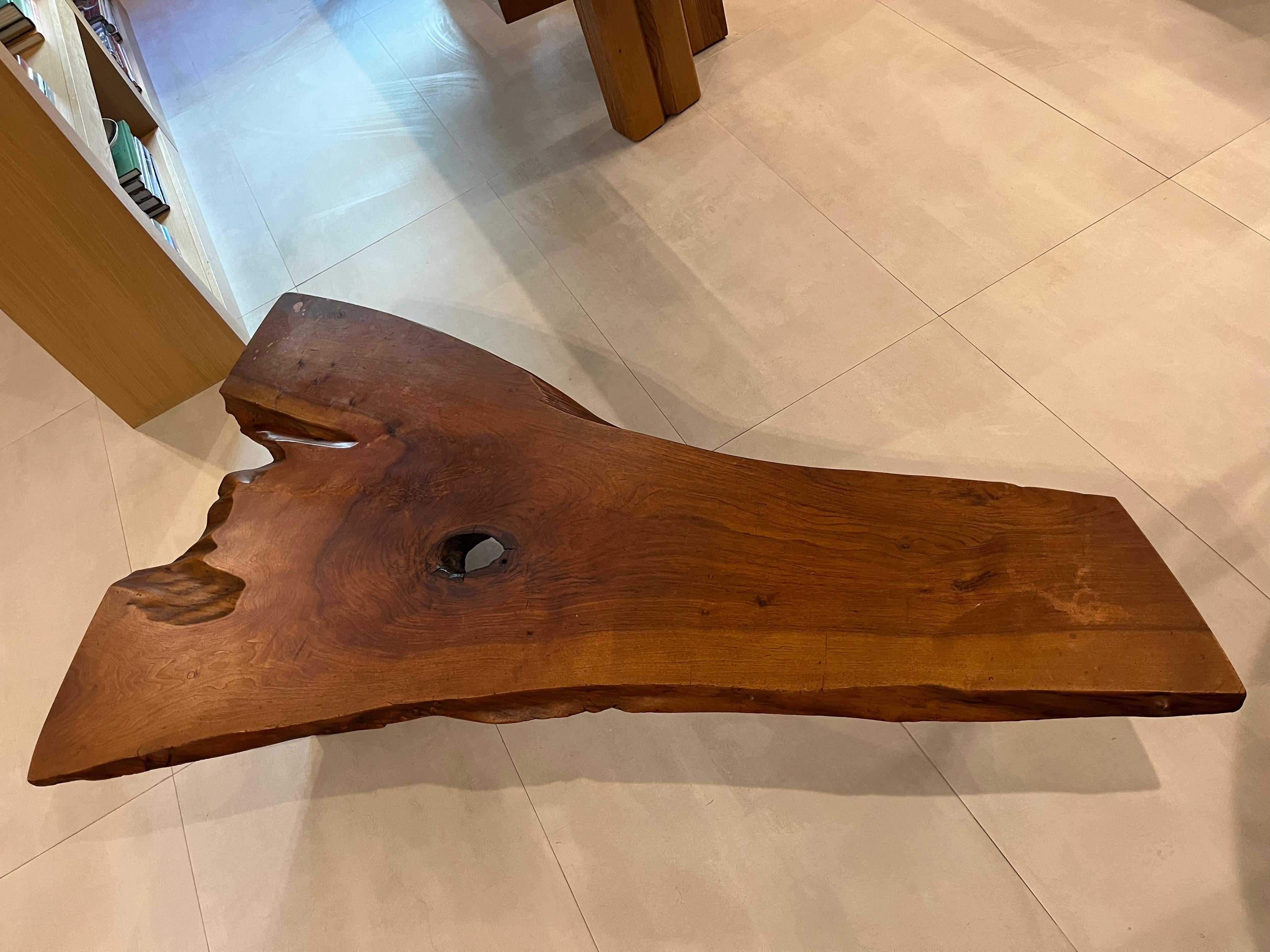 Stunning George Nakashima Slab Coffee Table, Walnut. 1960.
Table features a single slab top with three free edges, expressive figured grain, sap grain detail, and one exposed knot.
Sold with a digital copy of the original order card.