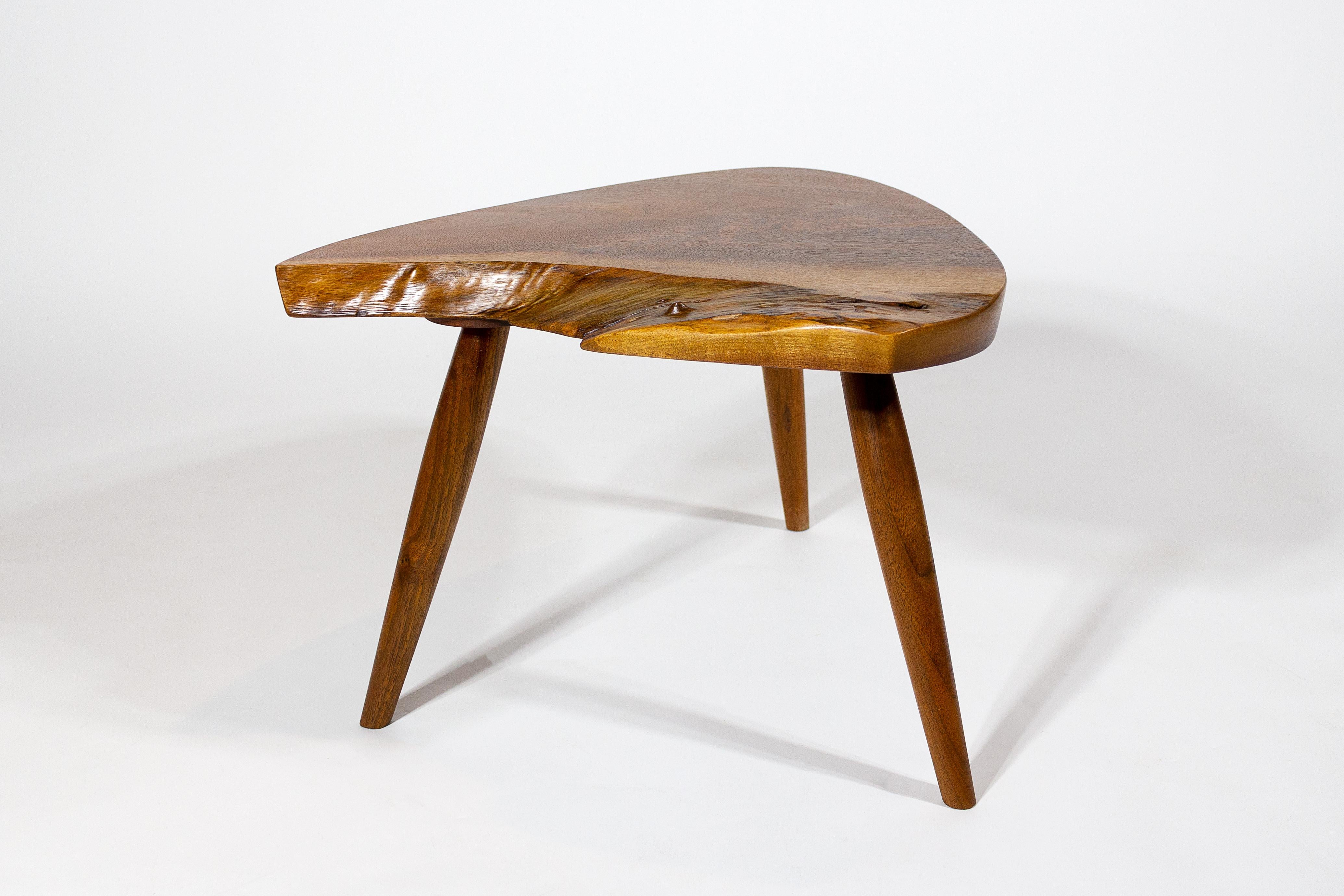 Set of three hand-made Wepman tripod side tables crafted in the George Nakashima Studio by his Daughter and protege Mira Nakashima. Commissioned for an important private Texas collection. Signed and dated to the underside. 

This trio of tables
