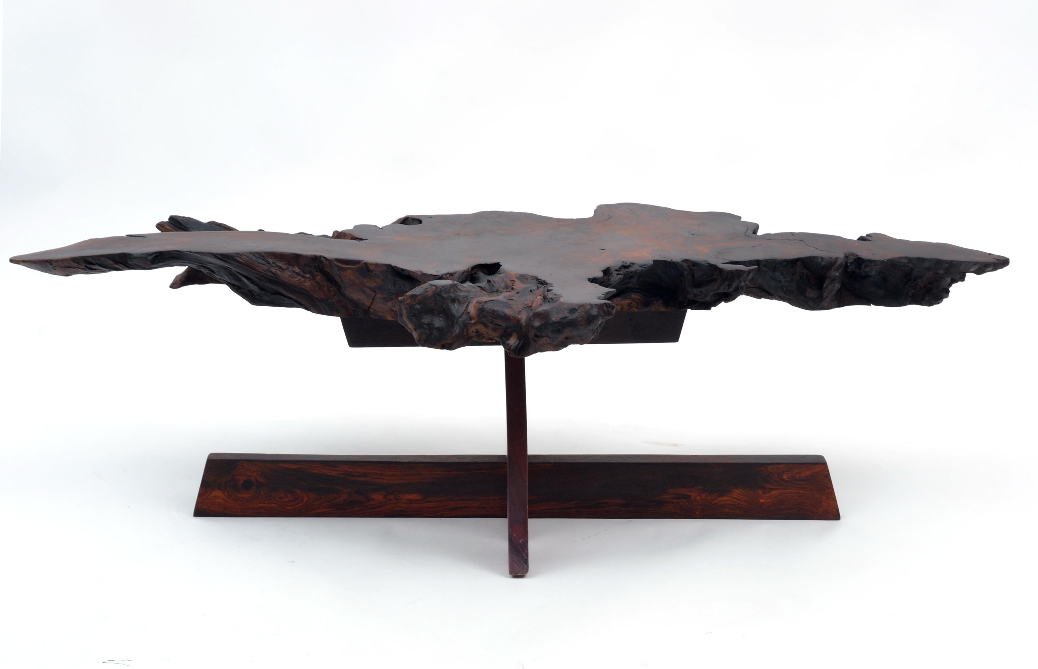 This beautiful redwood live edge slab rests on a Nakashima inspired exotic wood base. Please note that this is 