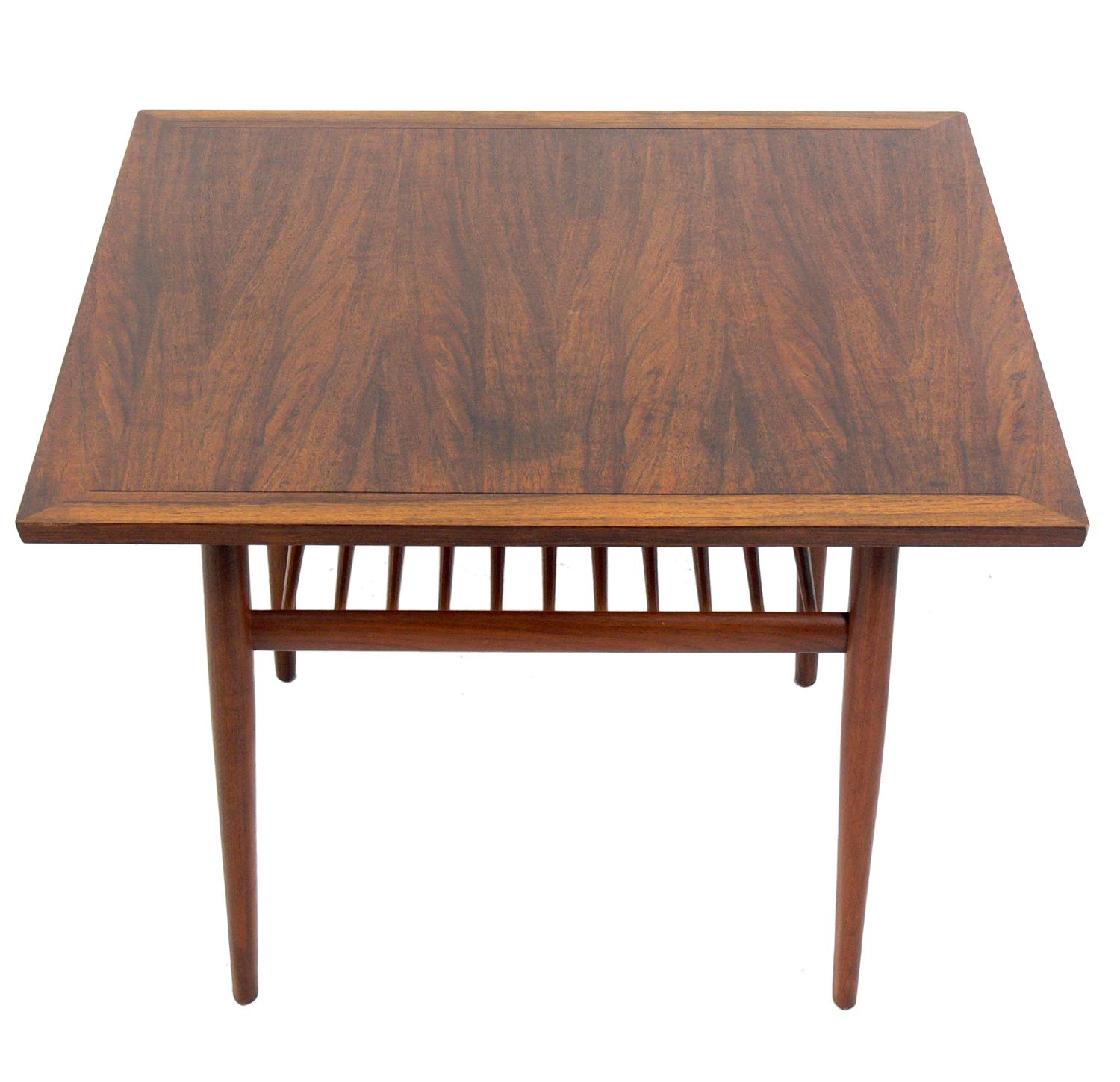 Clean lined walnut table, designed by George Nakashima for Widdicomb, American, circa 1960s. This piece is a versatile size and can be used as a side or end table, or as a nightstand or drinks table between two chairs.