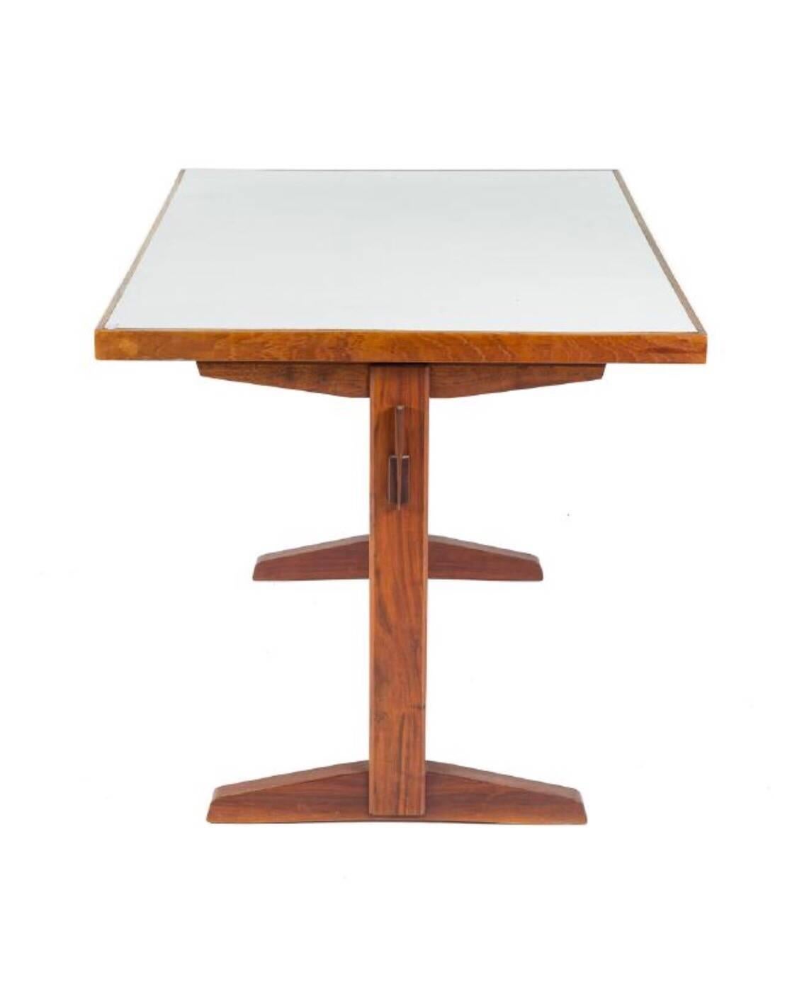 George Nakashima walnut table base with custom laminate top added by owner. Authenticated by order card copy.