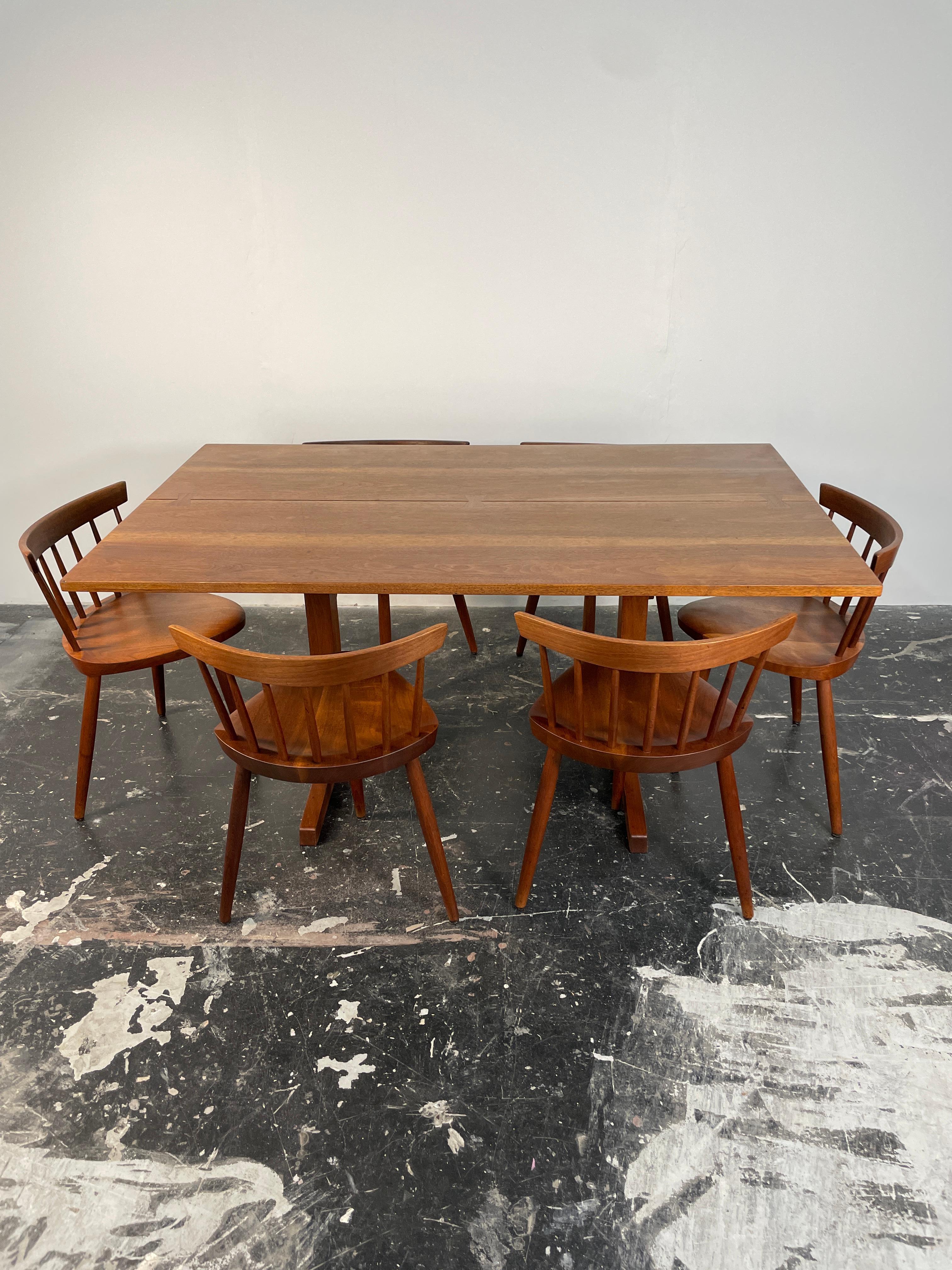 George Nakashima built Iconic Trestle Table.

One of our earliest designs of George Nakashima, this piece was inspired by the simple lifestyle of early American Shakers. The knock-down design allows for an easily removable table-top. The table stop