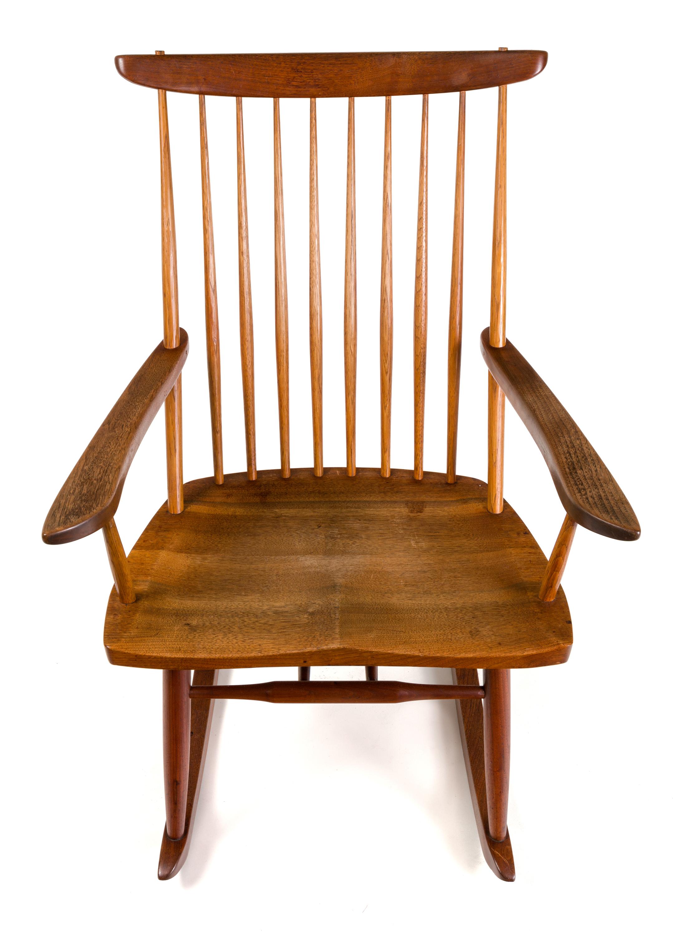 An early example of one of George Nakashima's iconic designs. It's elegant simplicity has made this rocker one of his most enduring designs.