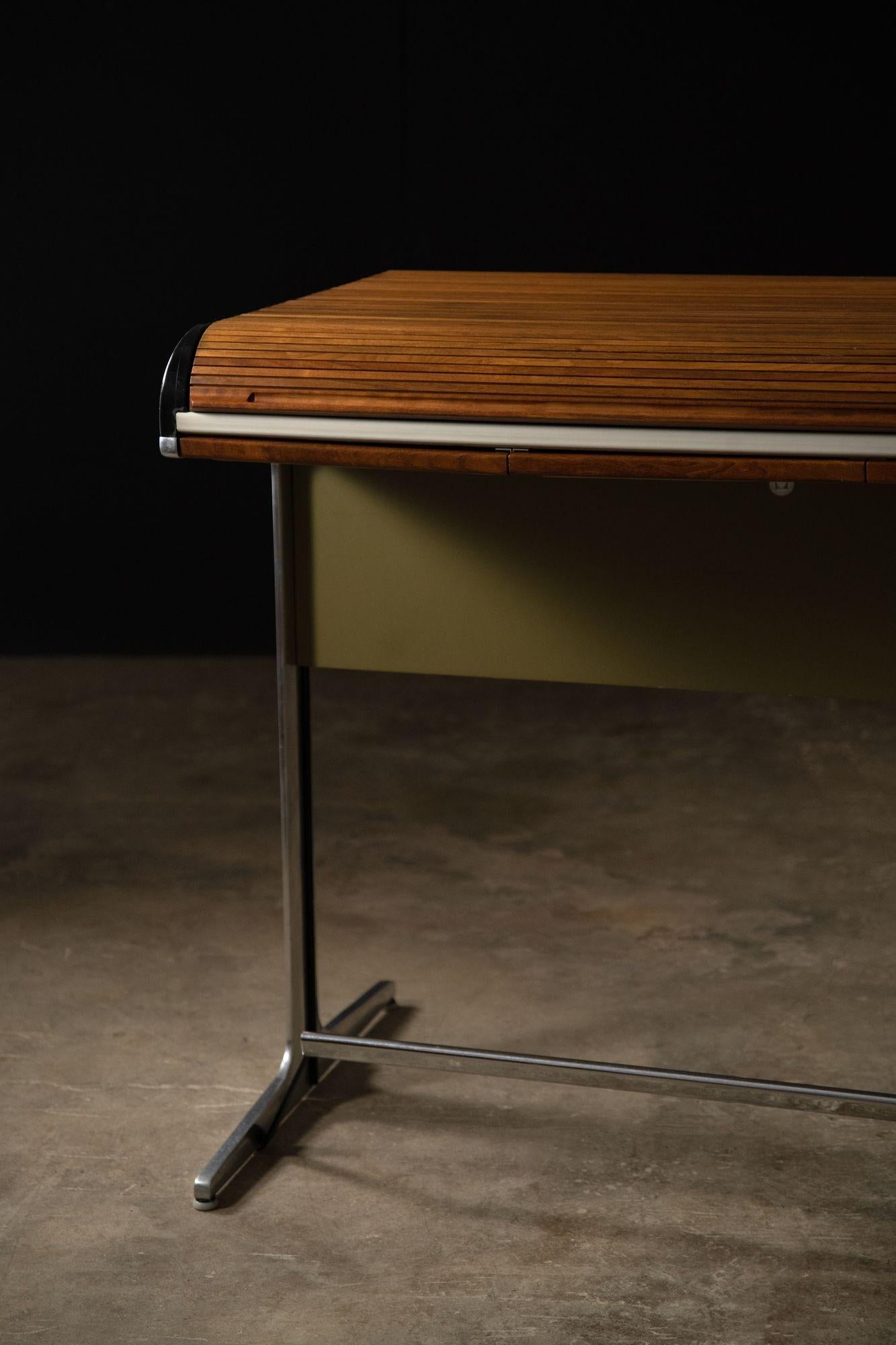 Striking black and walnut roll-top architect's desk with three drawers and hidden file storage.
Produced in 1964 by the Herman Miller company for the Action Office Series.
 
Retains the George Nelson for Herman Miller Medallion label.
