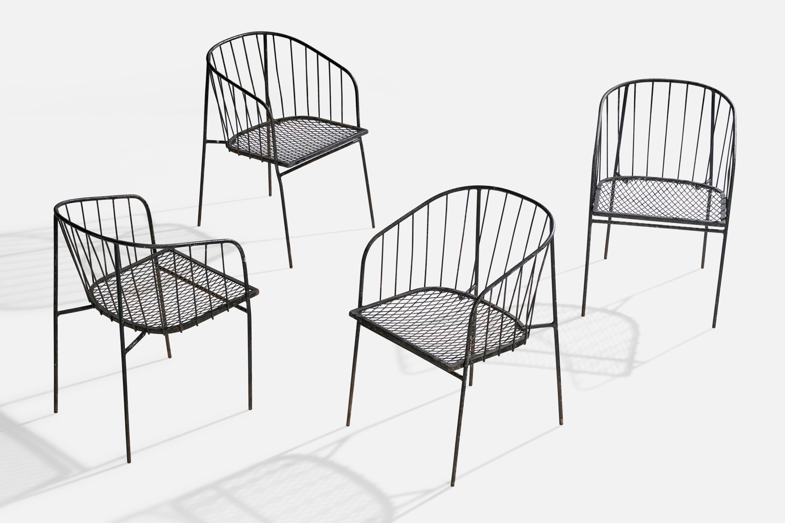 A set of four iron armchairs designed by George Nelson and produced by Arbuck, USA, c. 1952.

Dimensions: 29” H x 19” W 19” D

Seat height: 16.5”
