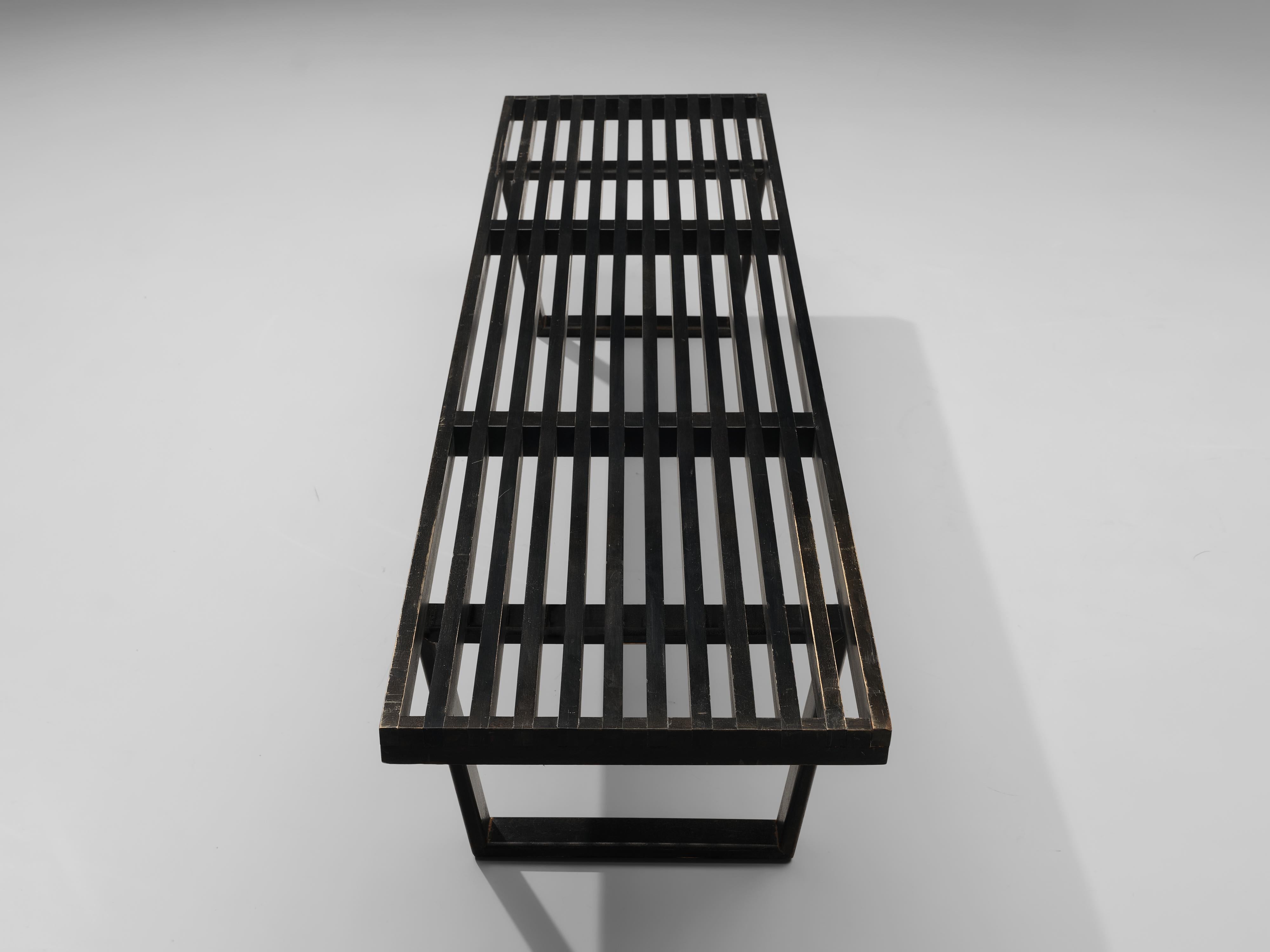 George Nelson for Herman Miller, ‘platform’ bench, black lacquered wood, United States, design 1946.

The ‘platform’ bench was part of the first collection that George Nelson designed for Herman Miller. The rectilinear lines of the wooden slats in