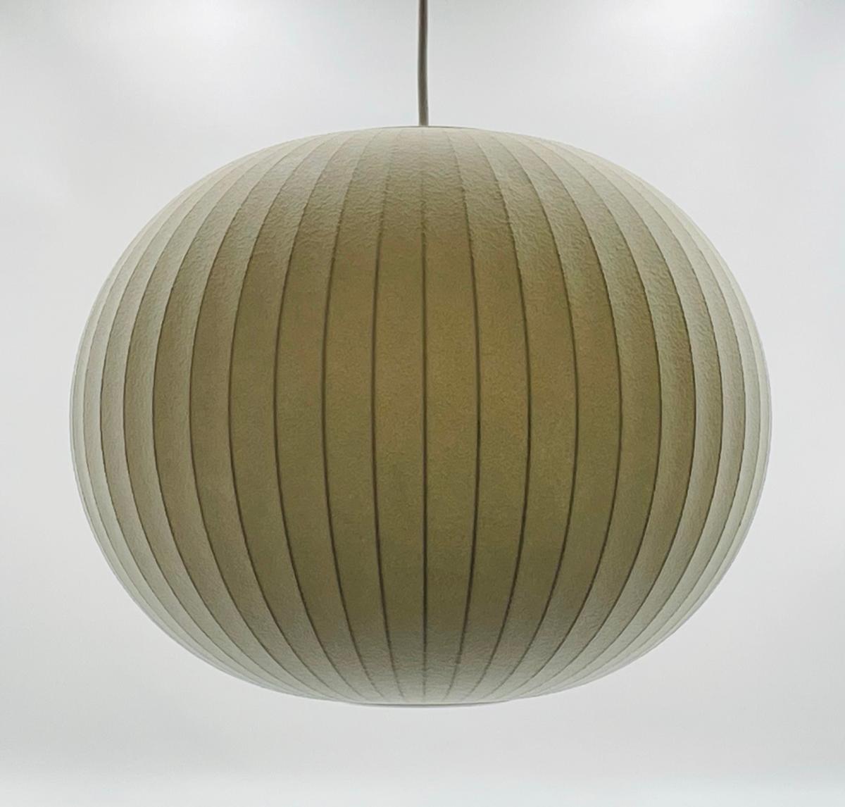 The George Nelson Bubble Pendant Light for Herman Miller is the perfect addition to any modern home or office space. Made in the USA with high-quality materials, this pendant light is a stunning example of minimalist design.

 
Designed by George