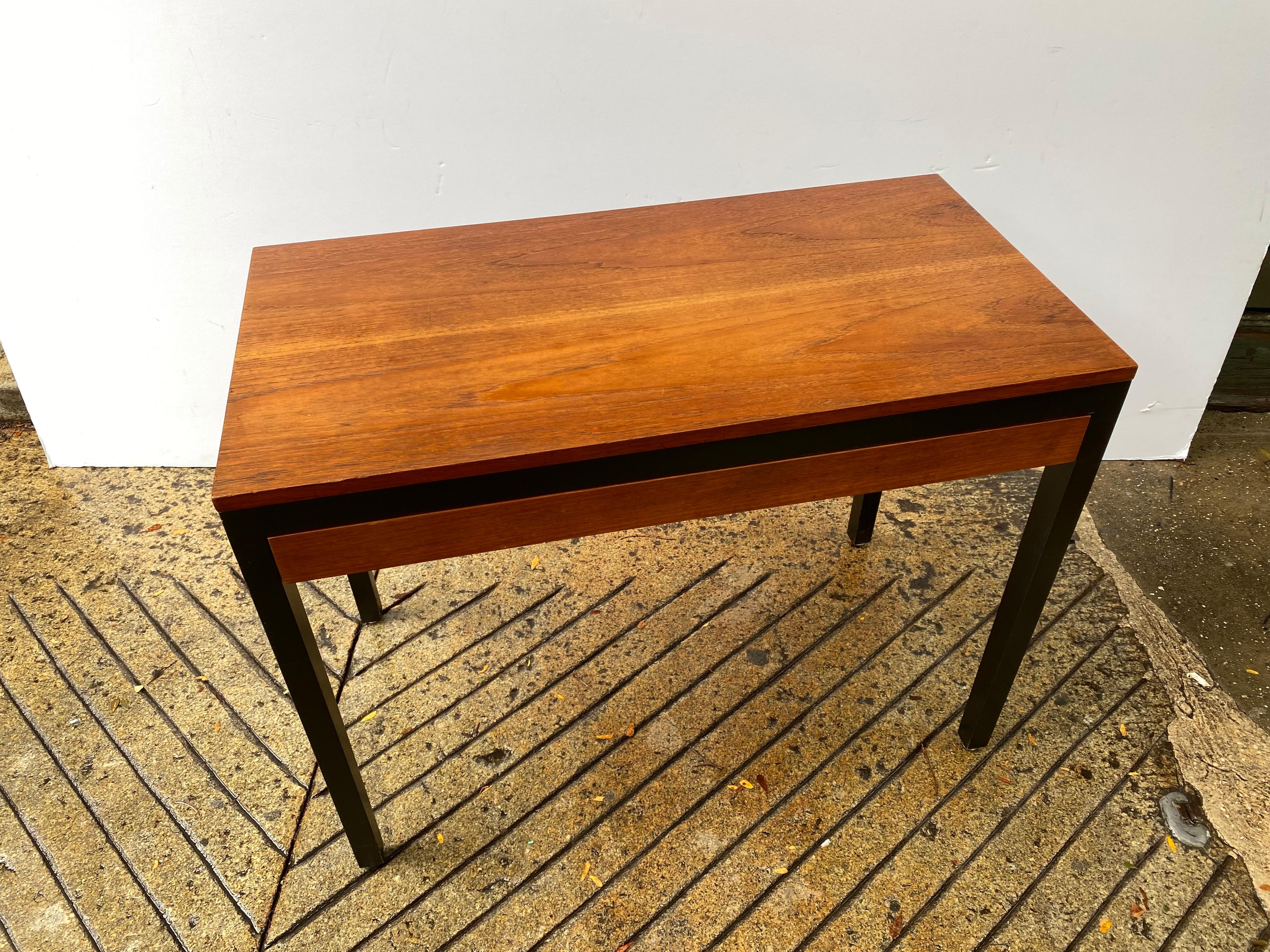 George Nelson for Herman Miller uncommon desk from the late 1950's. Walnut with black legs and trim. Seldom seen series. Matching dresser available as well! Top refinished, everything else original. Great compact scale and size!