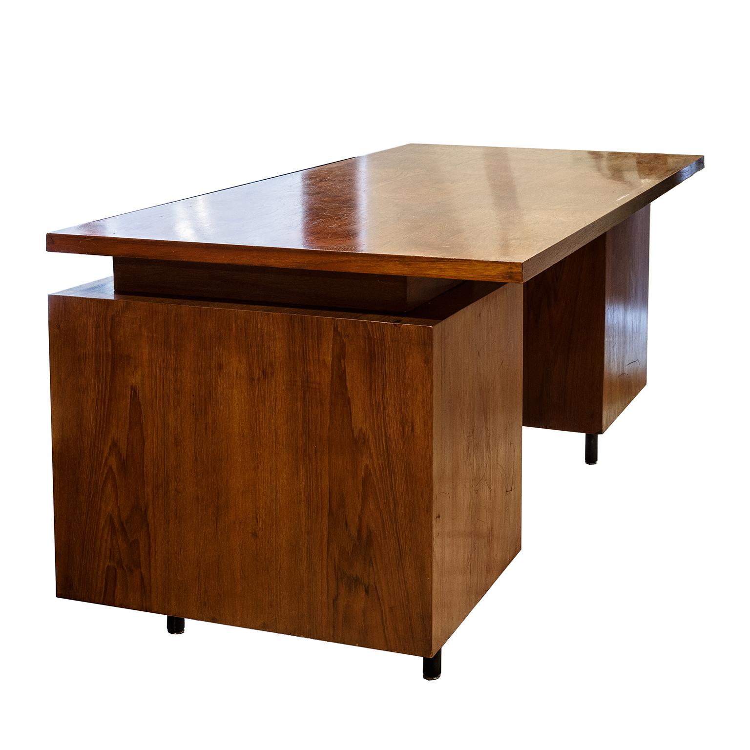 George Nelson designer writing desk in rose wood legs in Stel from Hermann Miller Production 1960s United States.