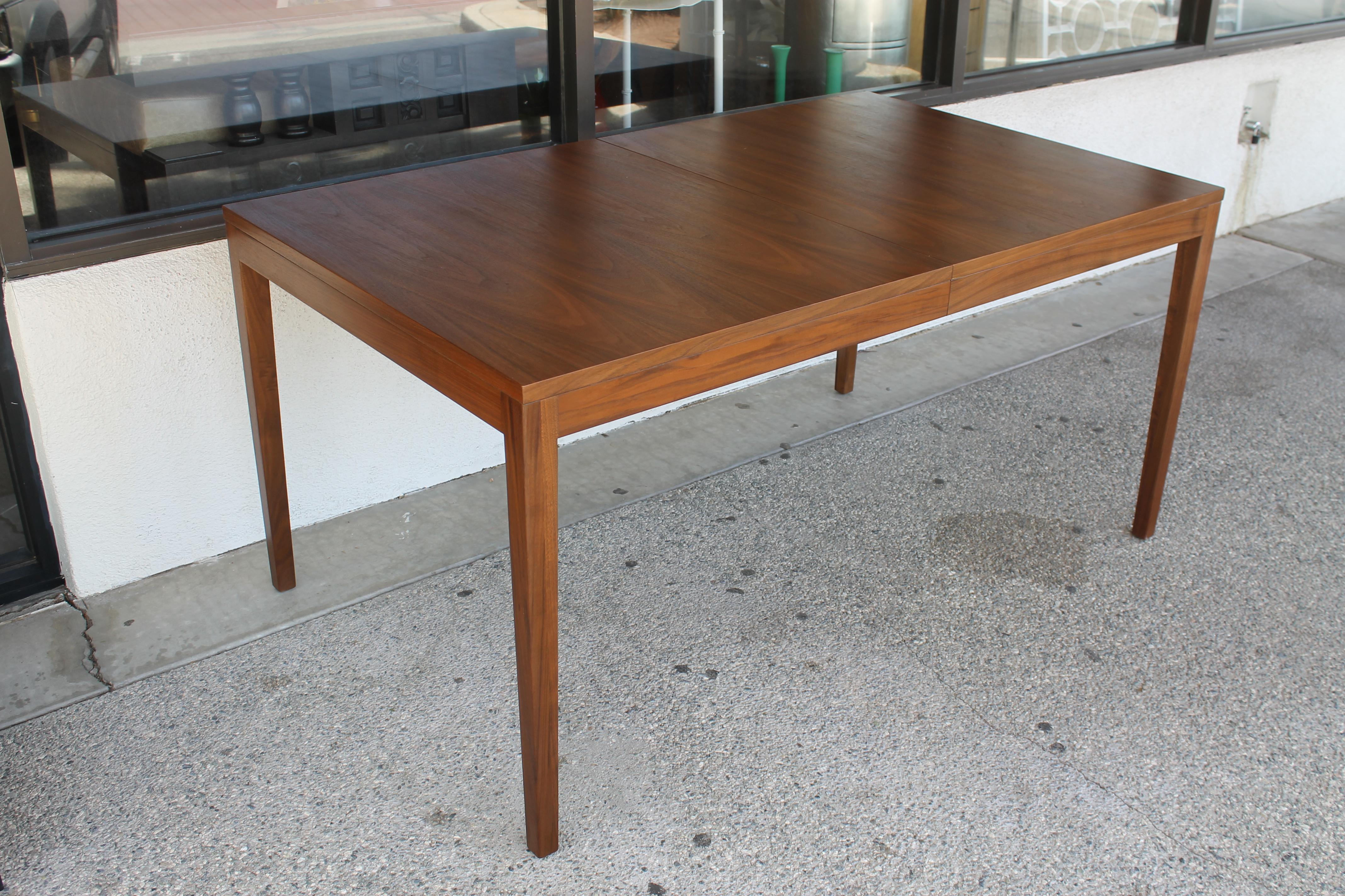 George Nelson walnut dining table for Herman Miller, Zeeland, Michigan. Table measures 60