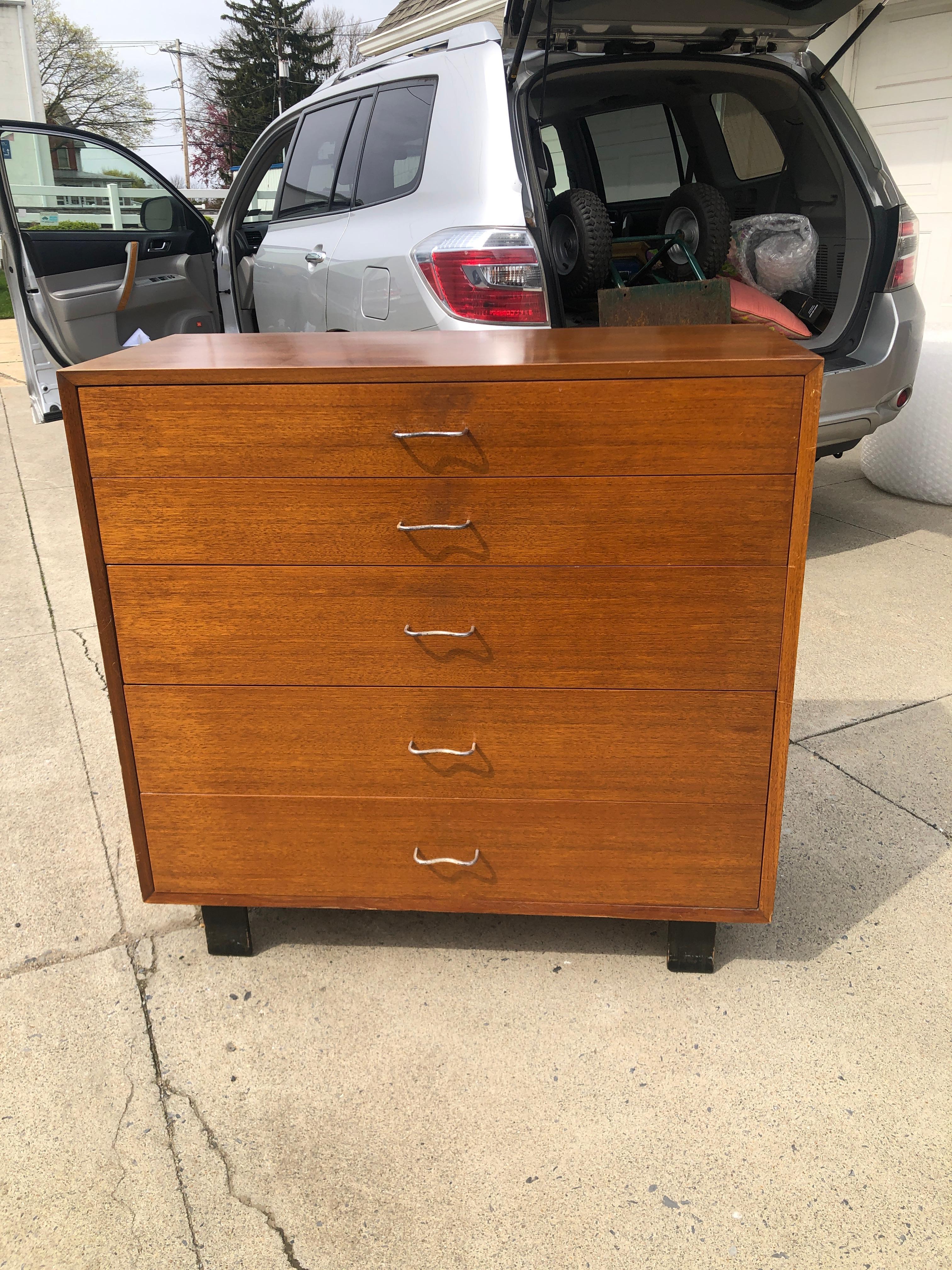 Mid-Century Modern 5 drawers high chest dresser cabinet by George Nelson for Herman Miller in mint original condition.
  