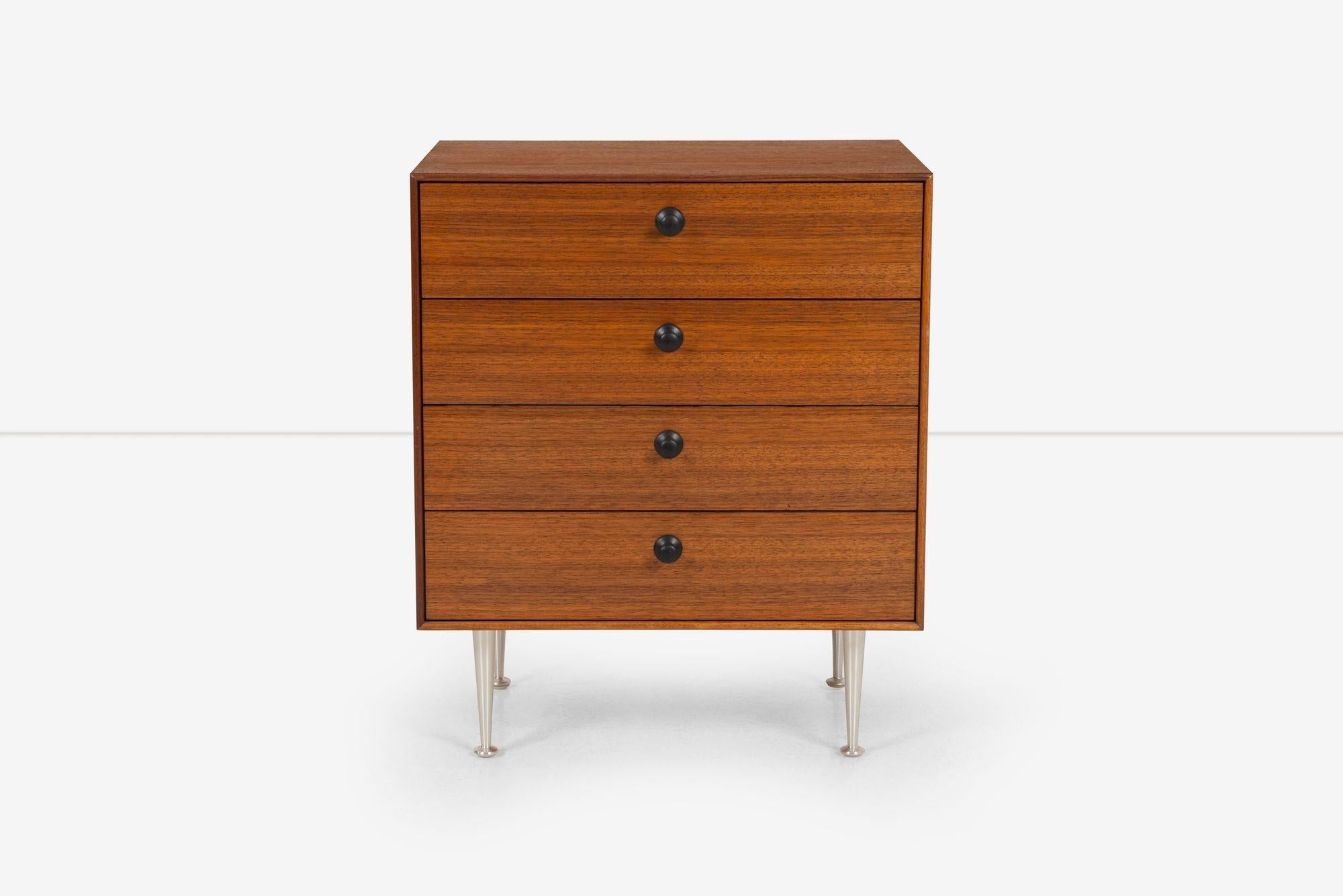 George Nelson for Herman Miller 4-Drawer Thin Edge Cabinet with Rare Pulls, oiled walnut with Tapered 7