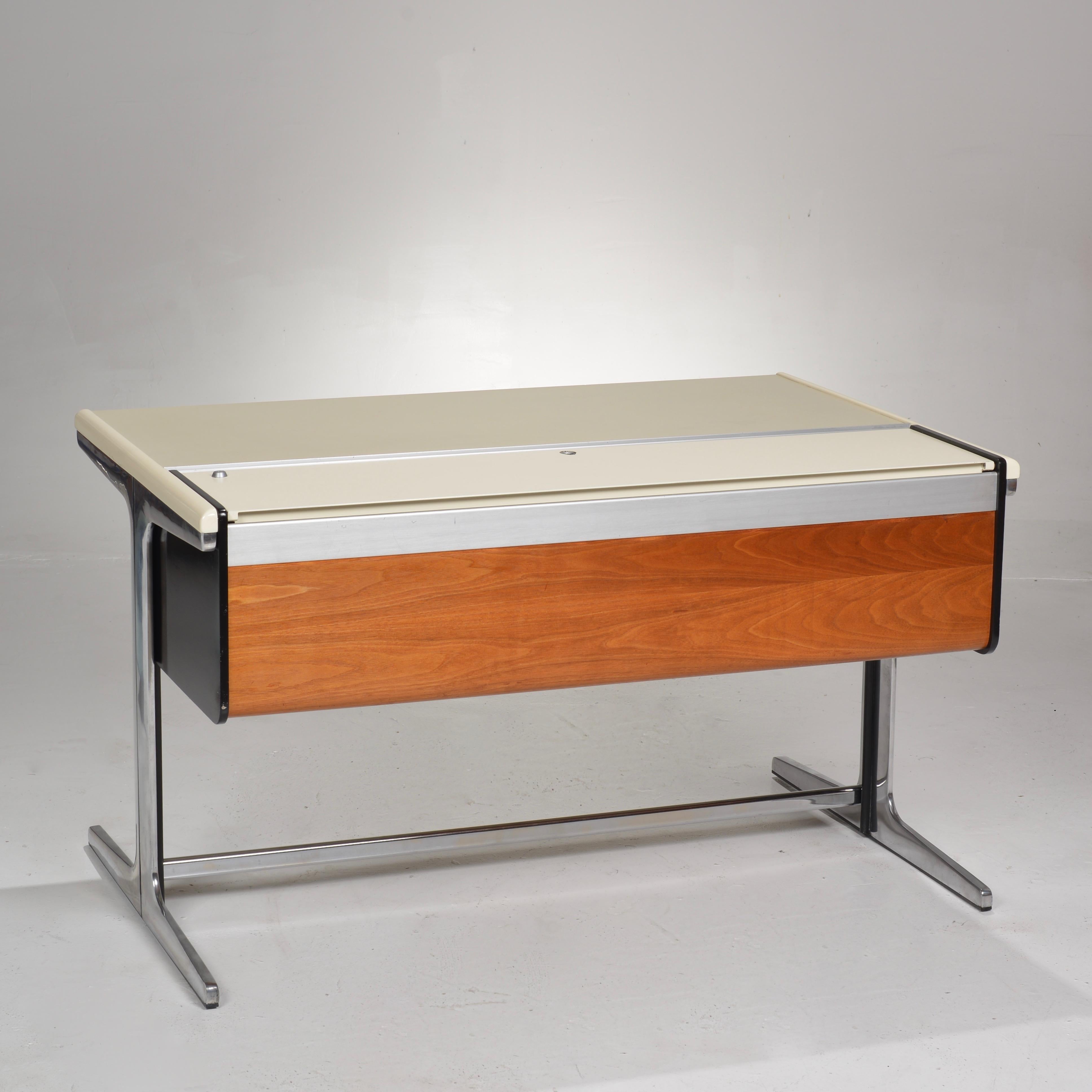 Early George Nelson Action Office 1 desk in original condition with minor wear.
George Nelson for Herman Miller, polished aluminum, plastic laminate, wood, United States, design 1953.