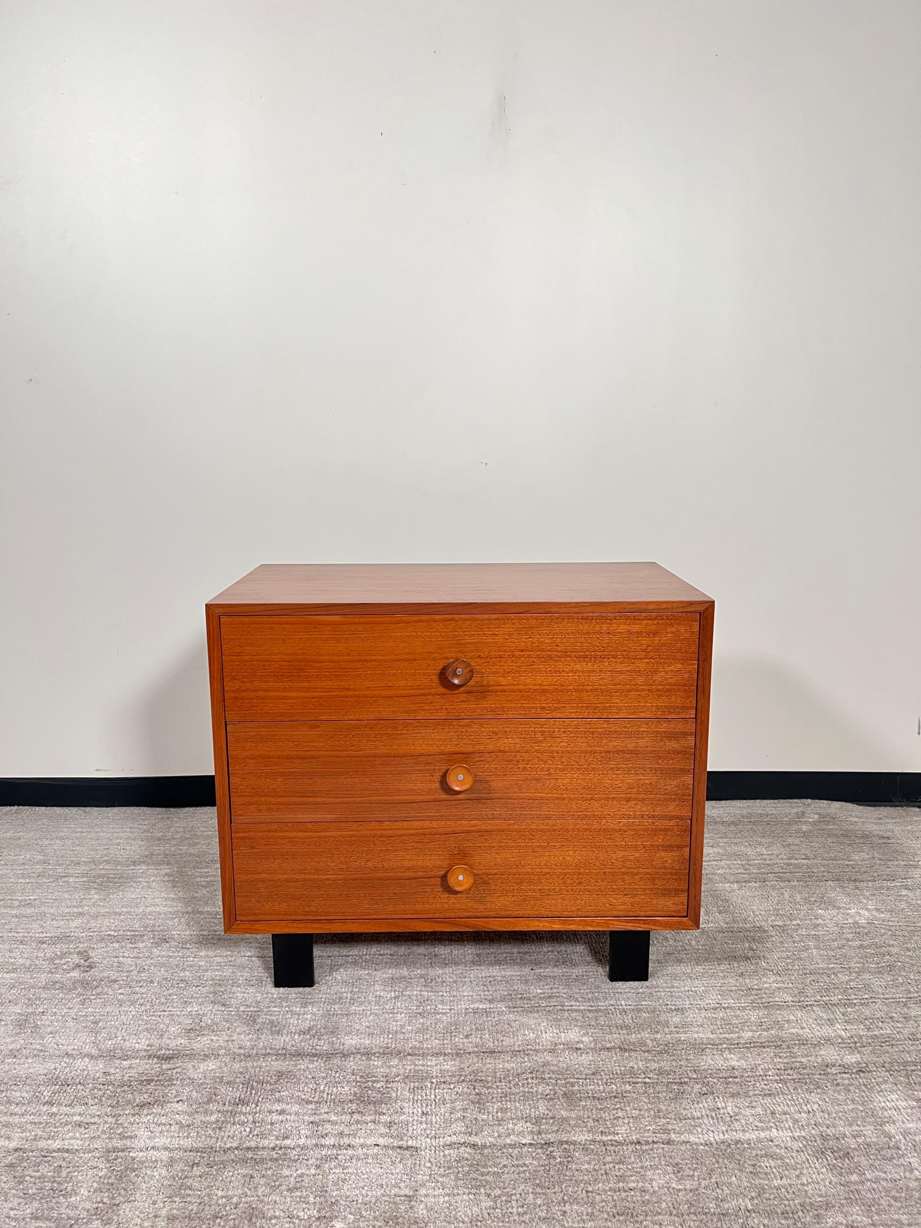 This fantastic chest of drawers was designed by George Nelson for Herman Miller, part of the 'Basic Cabinet Series' and also called 'Primavera', this dresser is signed with a 1950's Herman Miller foil label. Newly refinished, this beautiful piece is