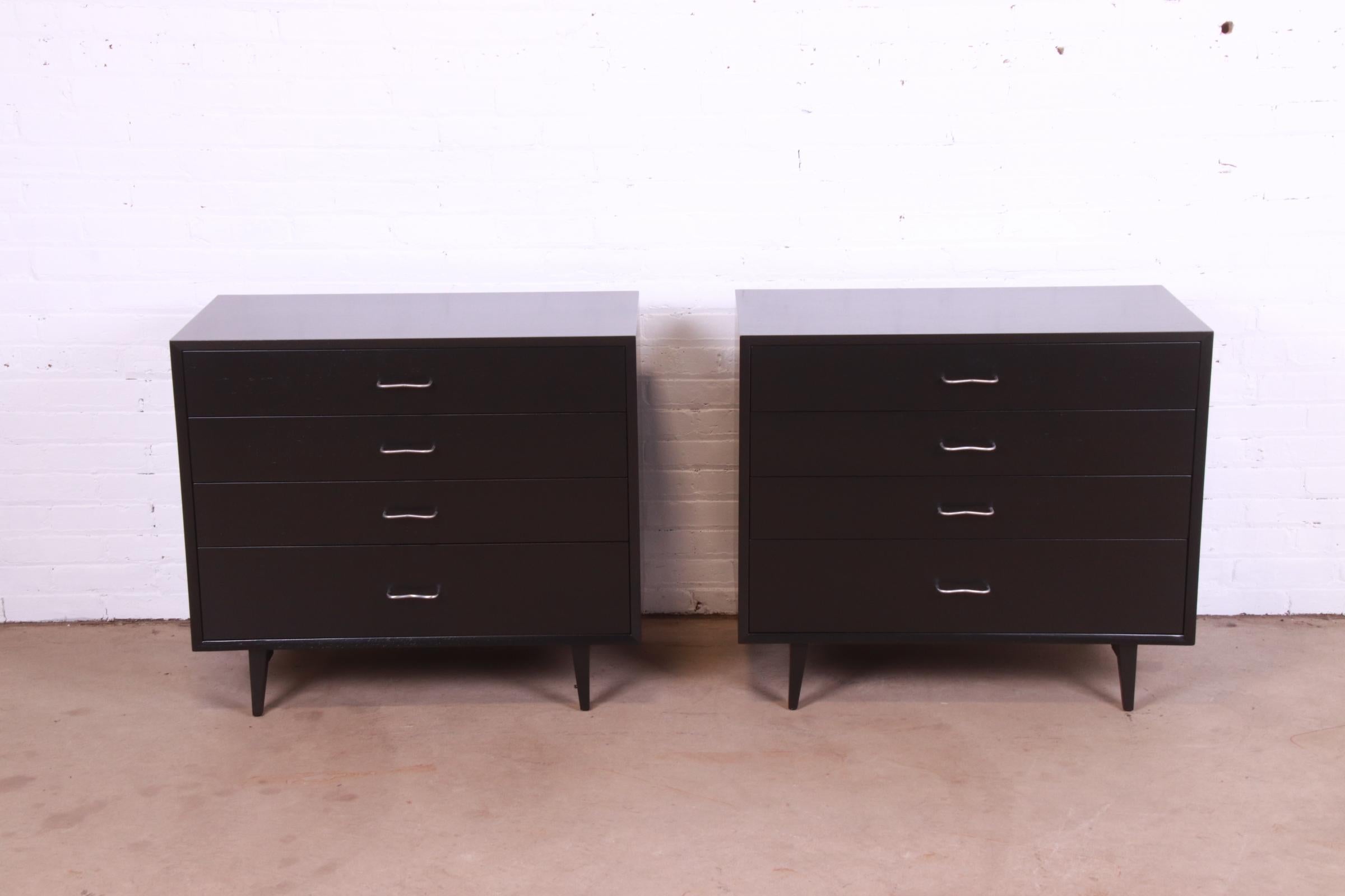 An exceptional pair of Mid-Century Modern four-drawer dressers, chests of drawers, or large bedside chests

By George Nelson for Herman Miller, 
