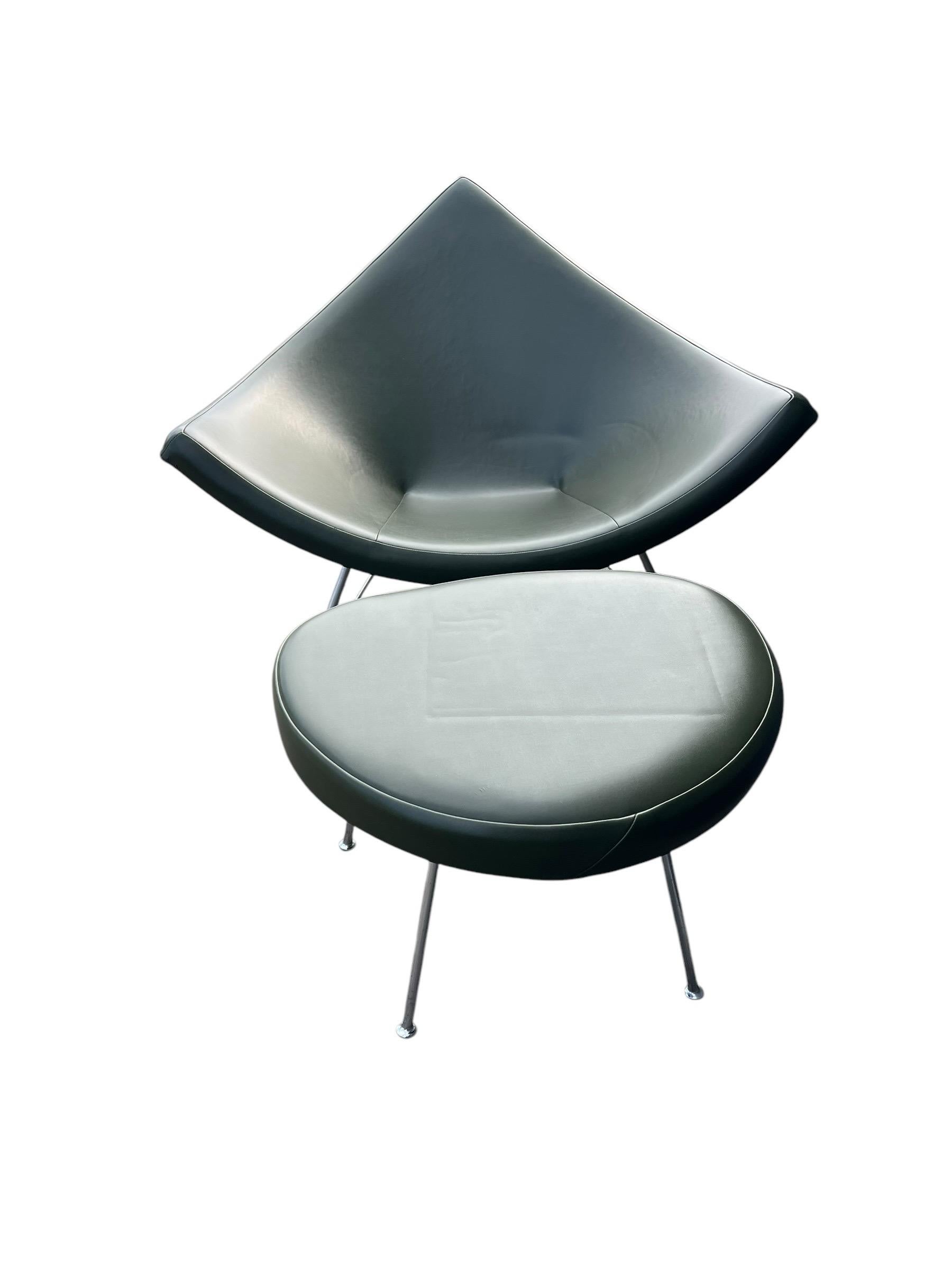 This is a nice clean original George Nelson for Herman Miller Coconut Chair and ottoman.  It came out of a well preserved architect’s estate, and is in very nice original condition with its green Naugahyde upholstery, with steel shell and chrome