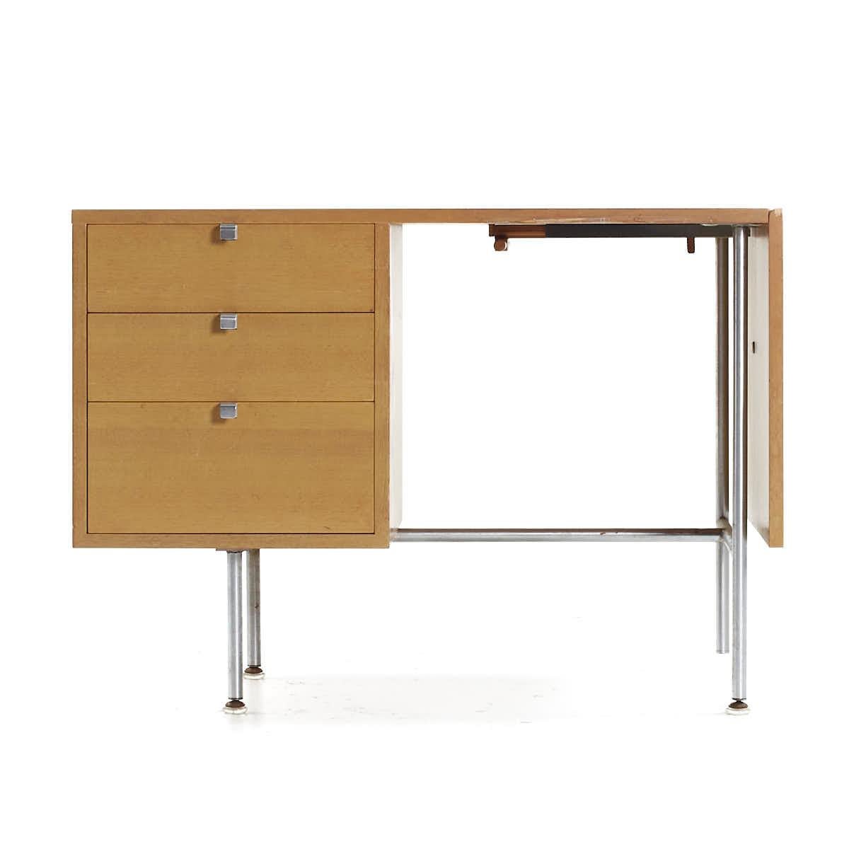 George Nelson for Herman Miller Mid Century Drop Side Desk

This desk measures: 40 wide x 24 deep x 28.75 inches high, with a chair clearance of 27.75 inches; the drop side is 18.25 inches wide, making a maximum desk width of 58.25 inches when the