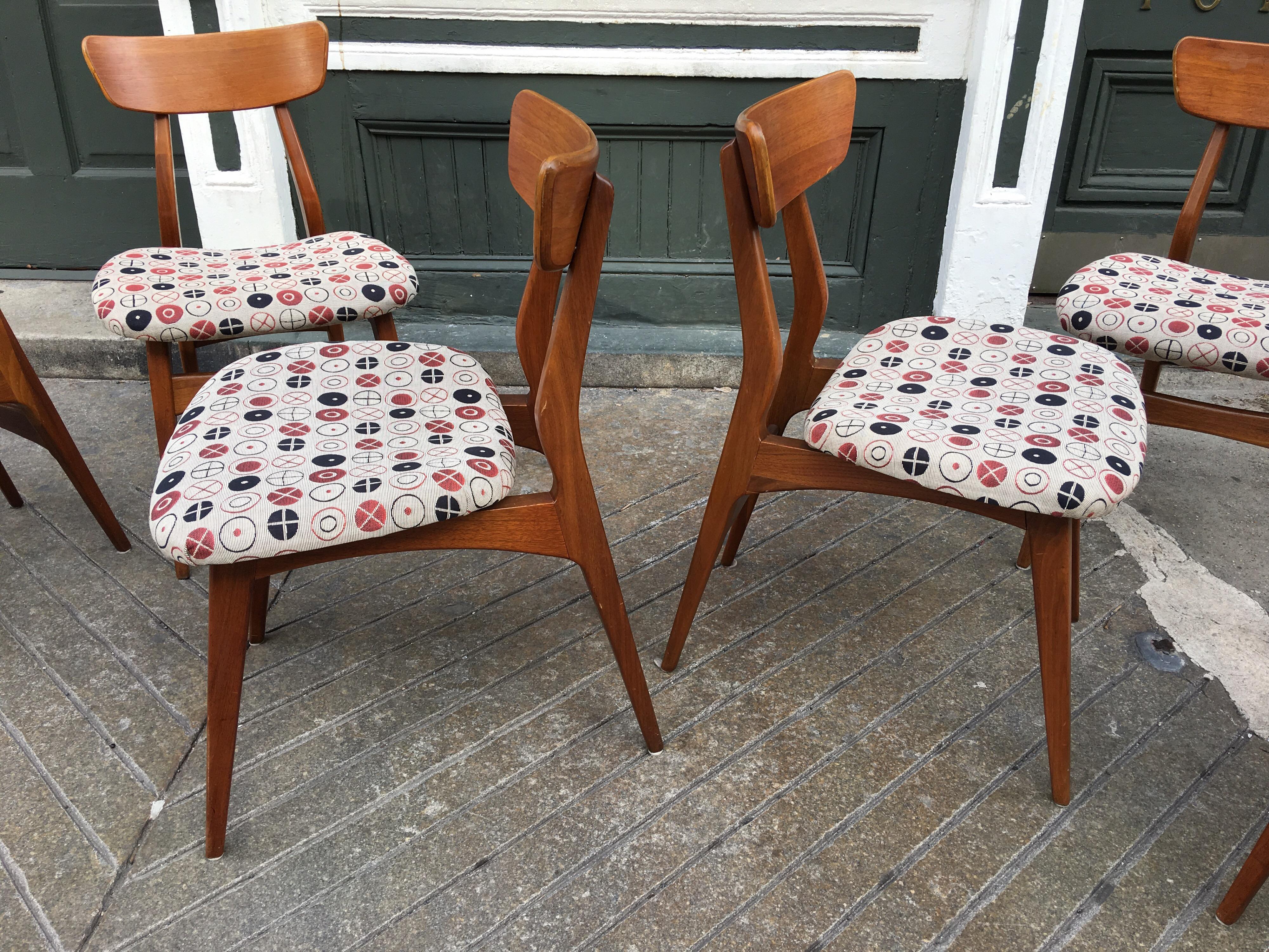 George Nelson for Herman Miller set of 6 dining chairs. Danish influenced solid walnut dining chairs with upholstered seat pads.