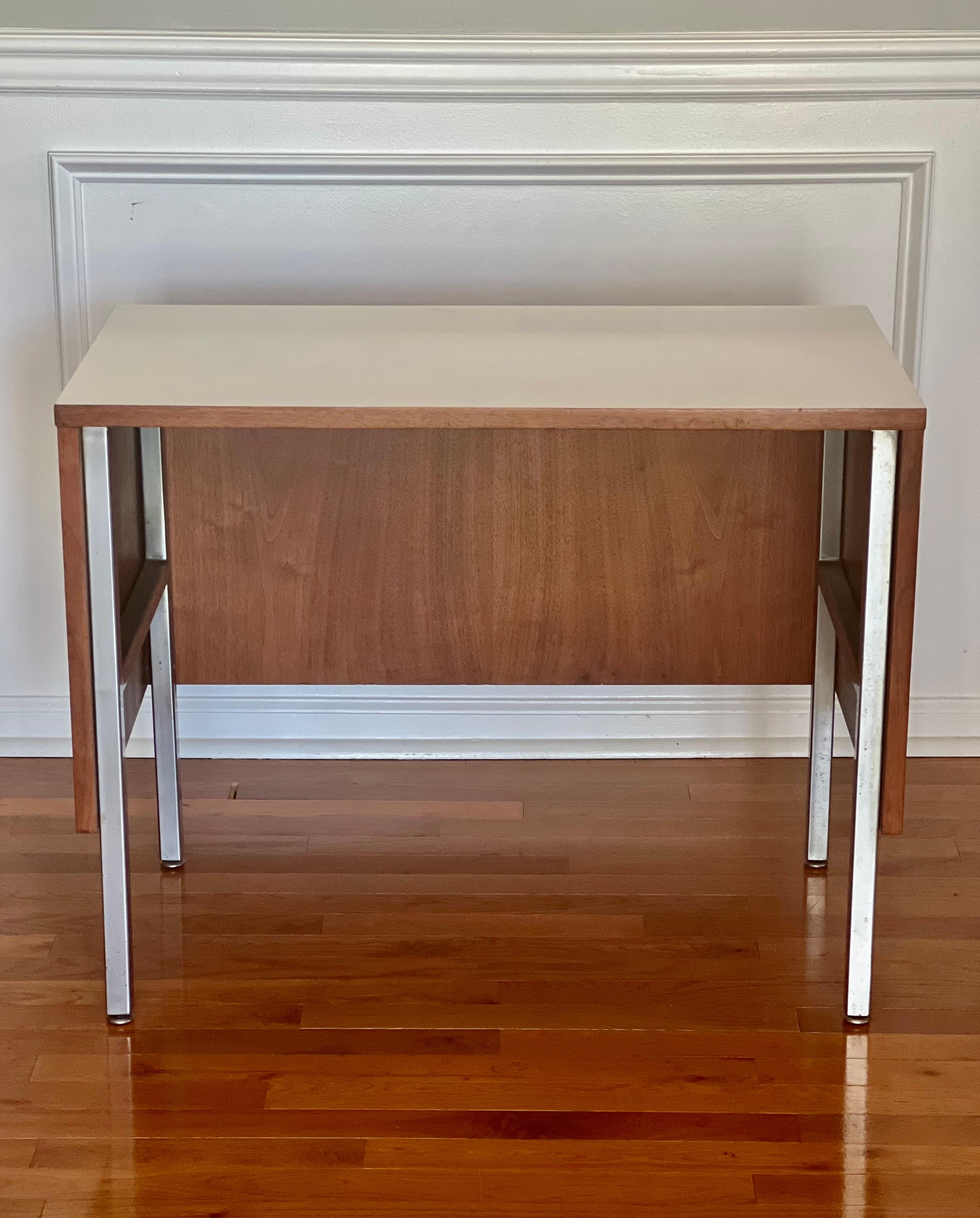 George Nelson for Herman Miller side table, work table or small console desk.

Great as a side/work table in a home office for printer, files, etc as a useful auxiliary piece to your main desk to ease workflow. Also perfect as a side table or small
