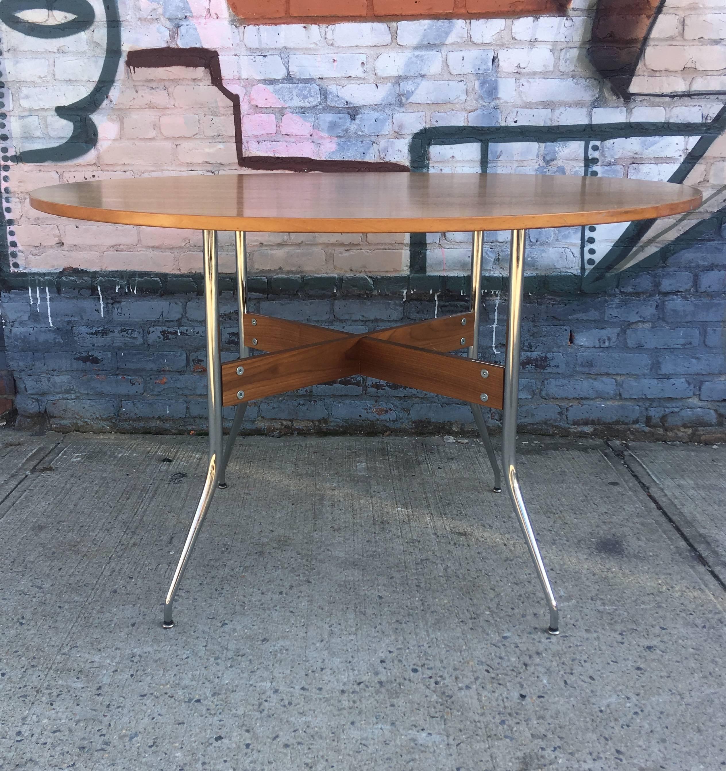 George Nelson for Herman Miller walnut dining table with swag leg base. Signed. No damage to top or base.
