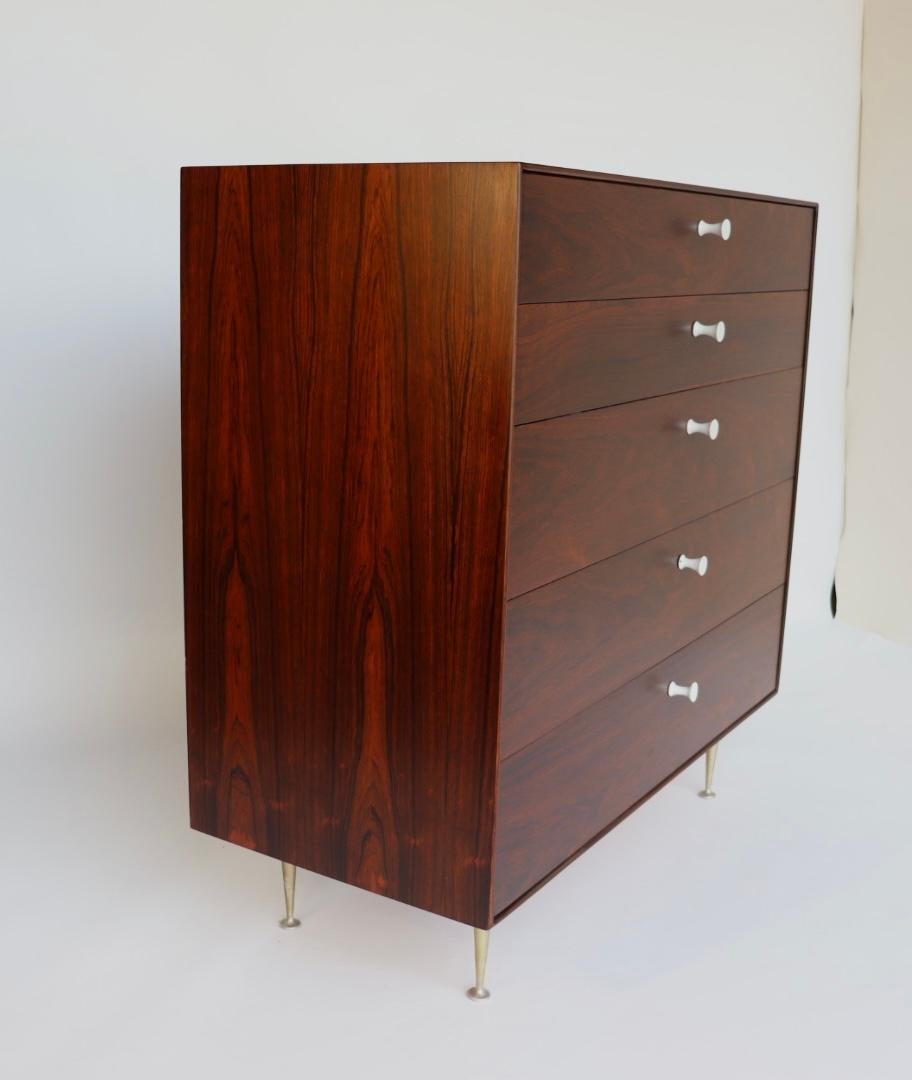 We have restored this George Nelson thin edge dresser for Herman Miller back to excellent condition. 

This thin edge is a collectors' dream, a George Nelson for Herman Miller 
