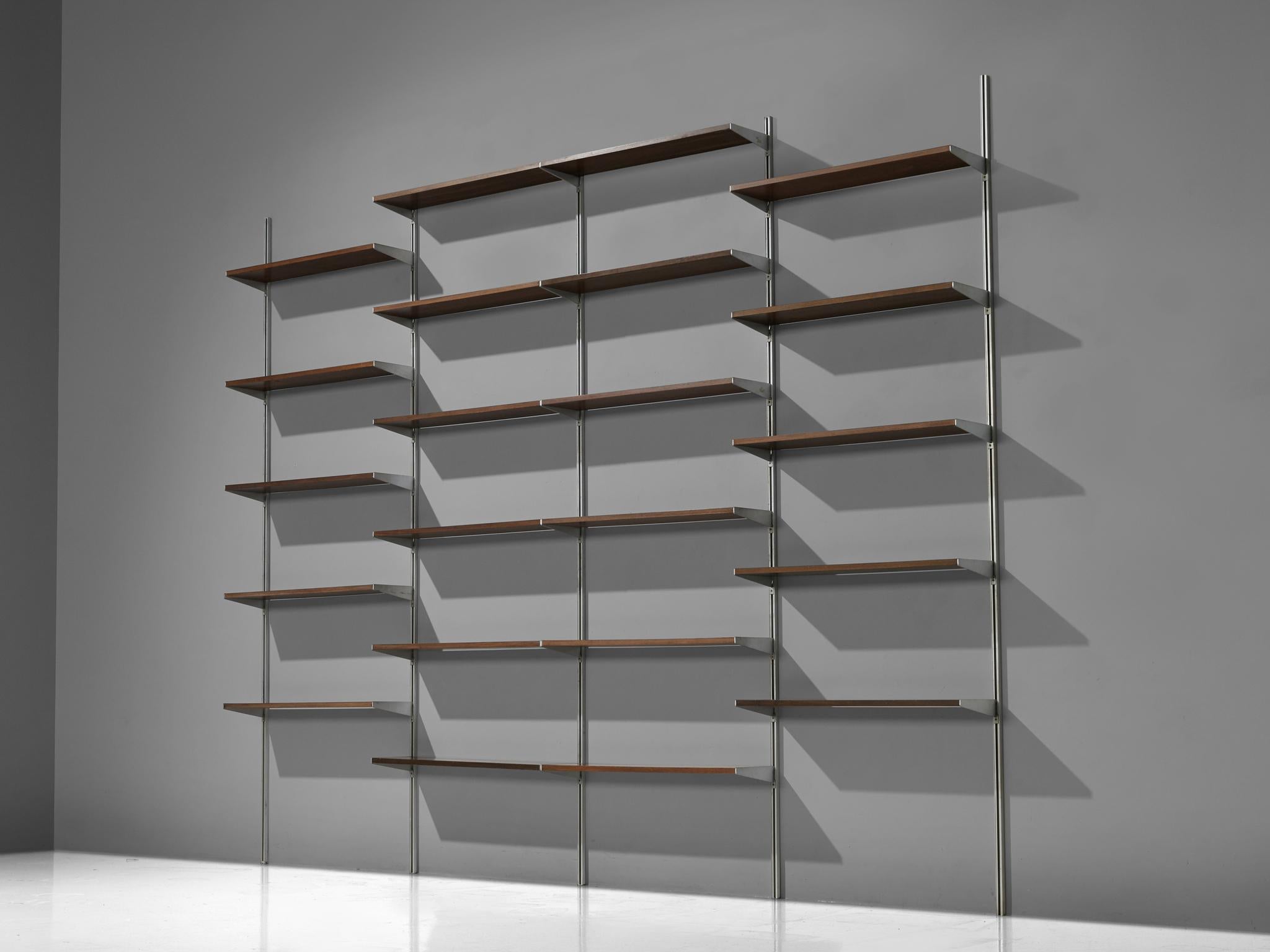 George Nelson for Herman Miller, 'Comprehensive Storage System (CSS)' wall unit, steel, aluminum, walnut, United States, 1960s

This storage system is designed by Nelson in the 1960s for Herman Miller. It's official name is the 'Comprehensive