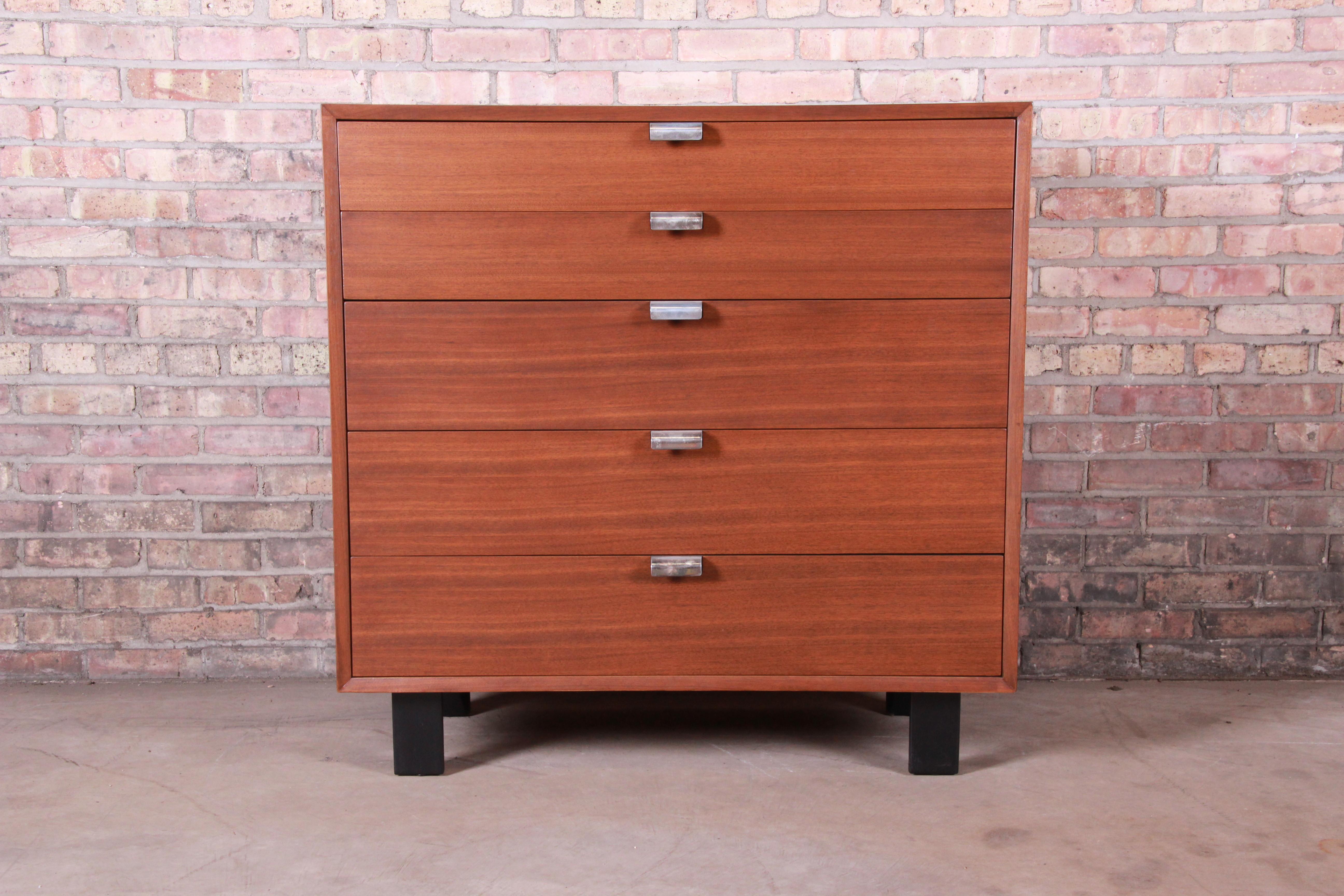 An exceptional Mid-Century Modern walnut five-drawer highboy dresser chest

By George Nelson for Herman Miller 
