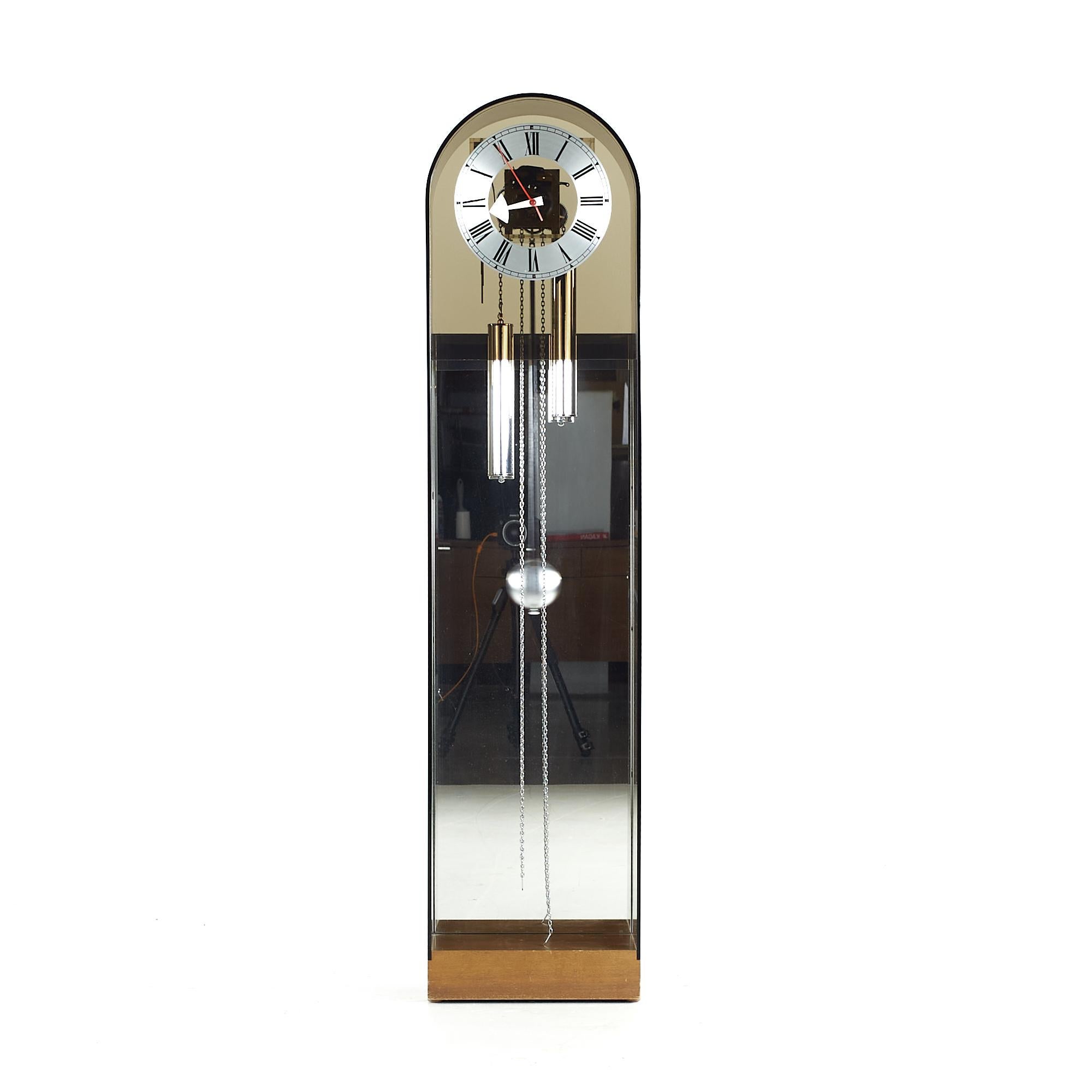 George Nelson for Howard Miller Mid Century lucite Grandfather Clock

This clock measures: 13 wide x 9 deep x 55.25 inches high

We take our photos in a controlled lighting studio to show as much detail as possible. We do not photoshop out