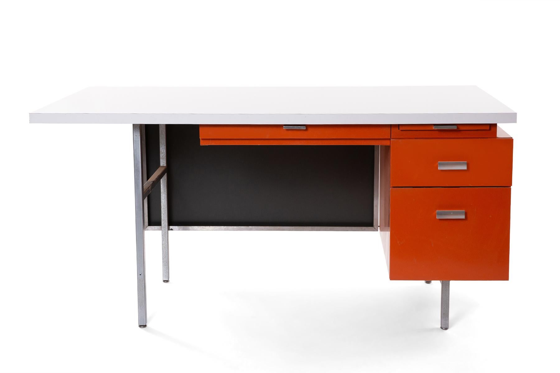 George Nelson for Herman Miller desk and credenza or return circa early 1960s. These all original seldom seen examples have orange drawer fronts with inset metal pulls, steel legs and white formica tops. The desk has a wicker privacy screen as well.