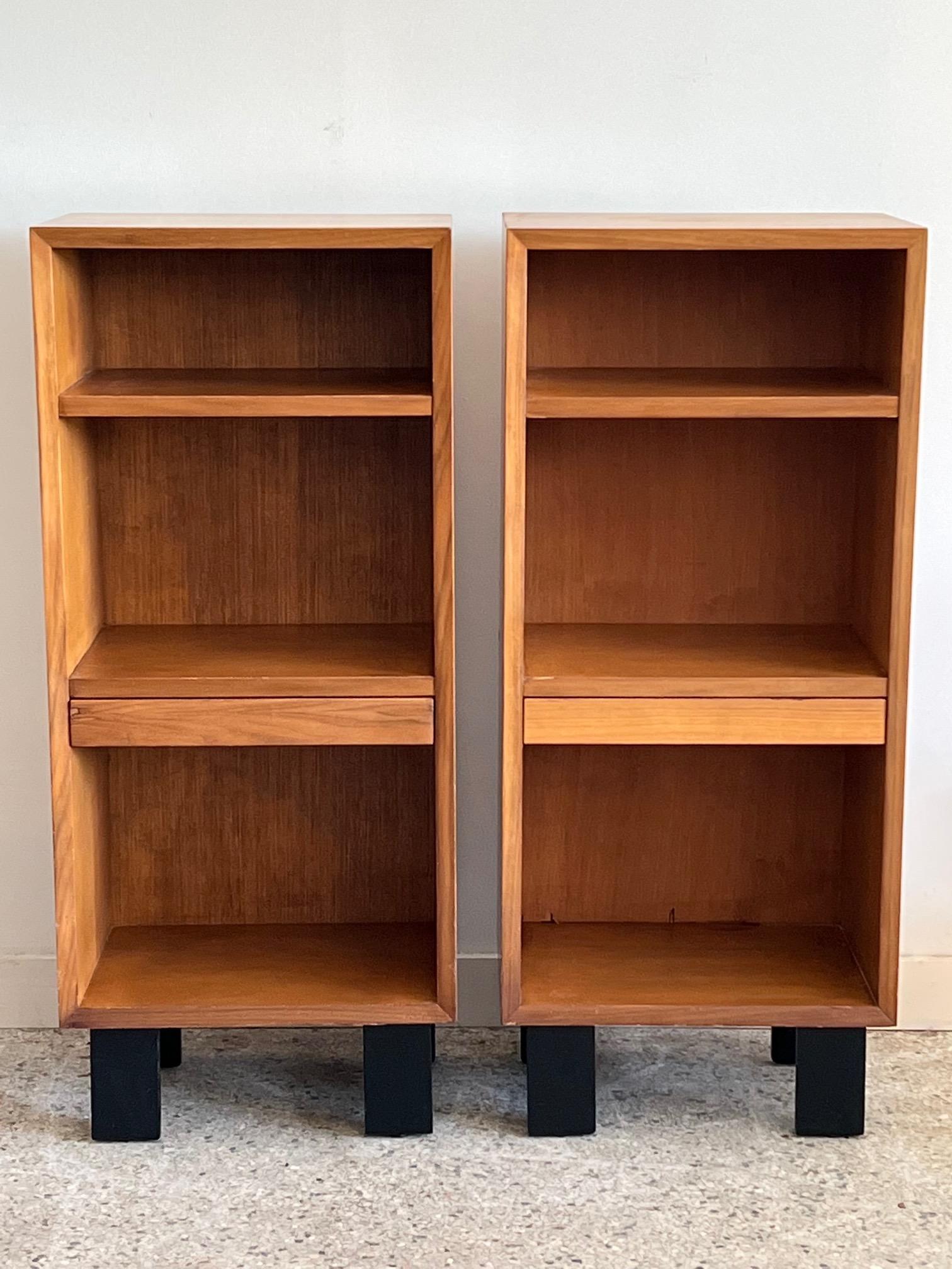 A pair of Classic night stands in walnut by George Nelson for Herman Miller. At close to 40