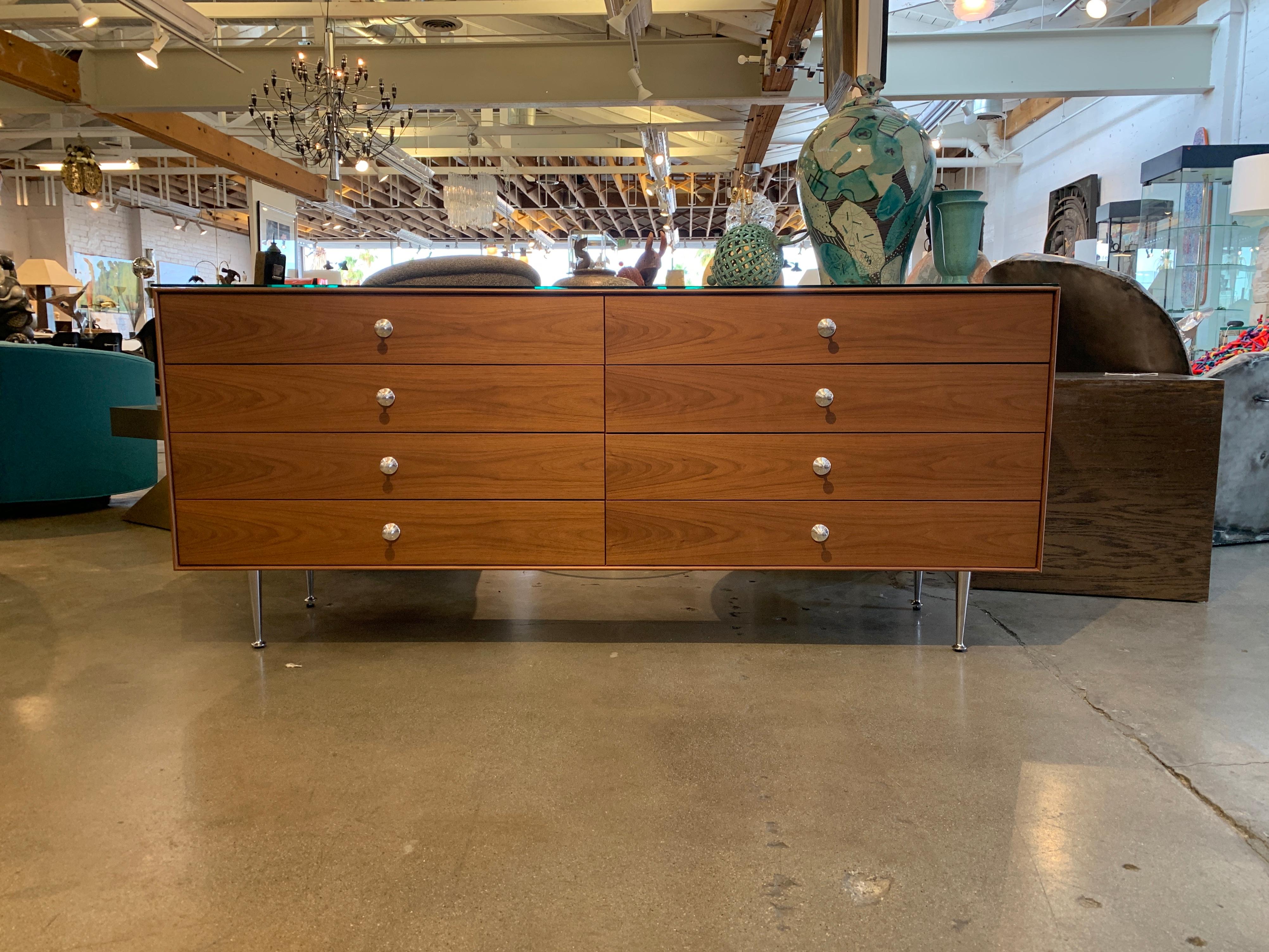 A nice example of a Classic George Nelson Design in walnut, this Thin edge chest produced by Herman Miller dates to 2017. Comes with labels and a certificate, which is pictured.