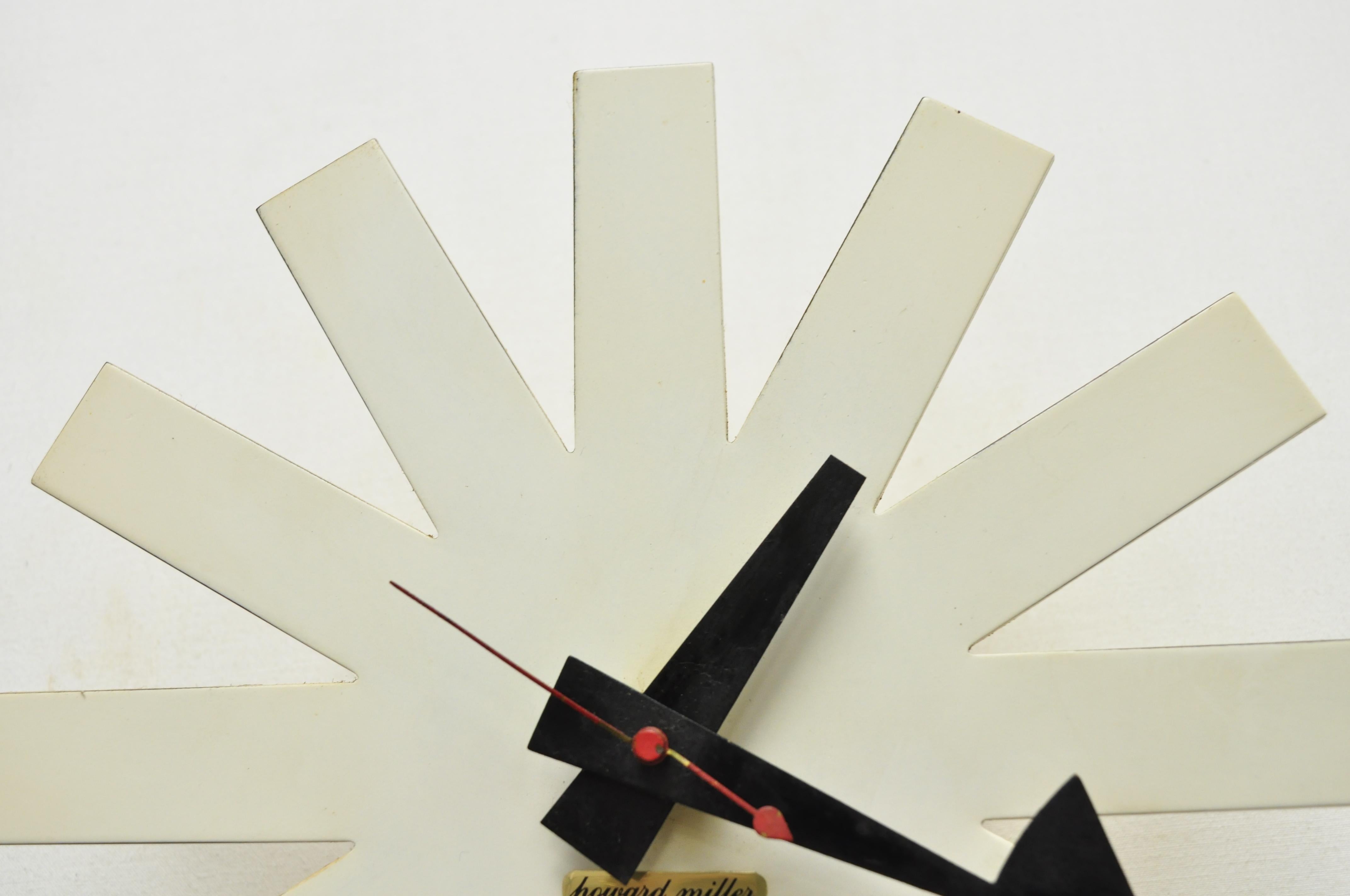 George Nelson Howard Miller model 2213 asterisk white wall clock, circa mid-20th century. Measurements: 10