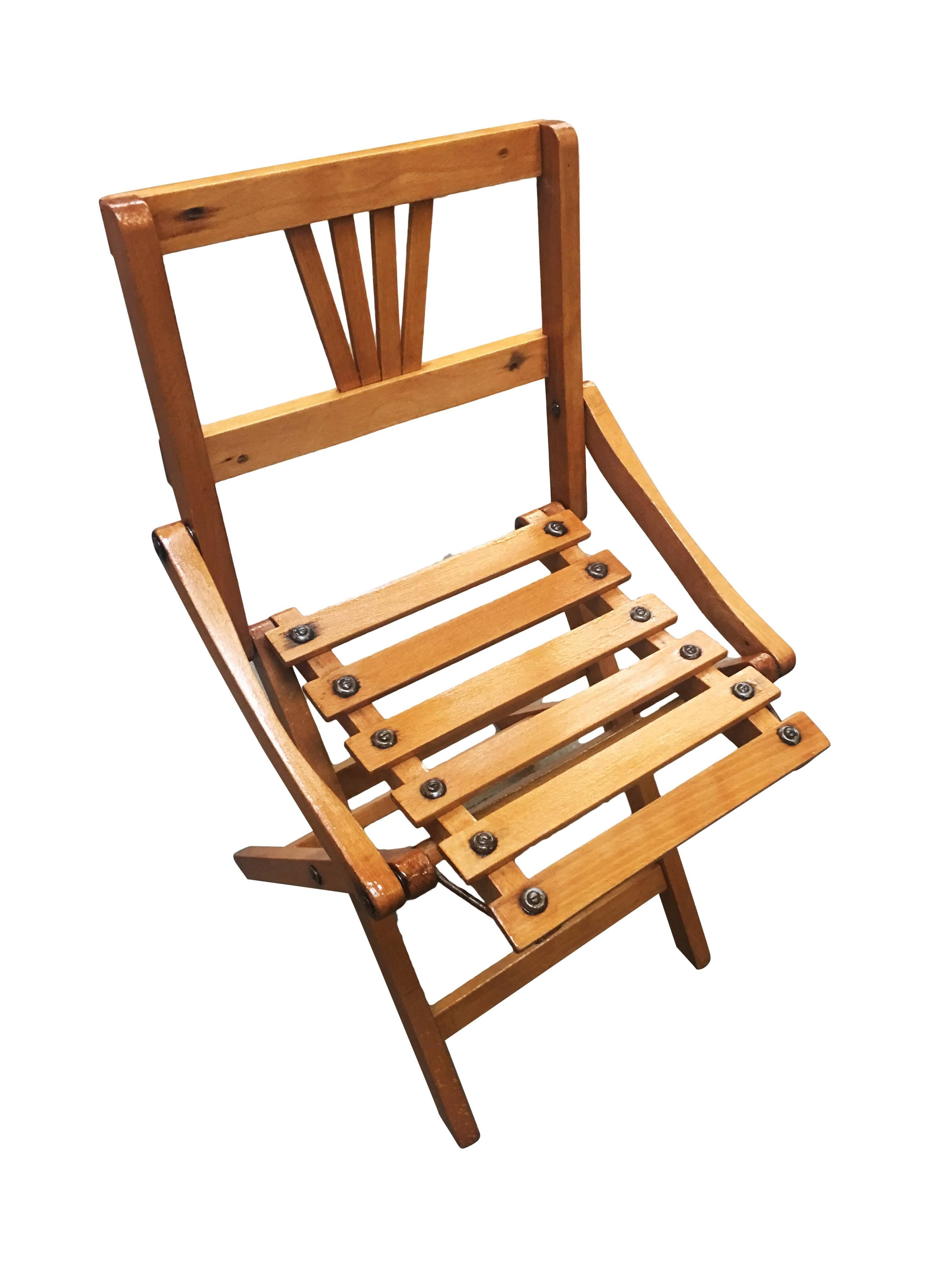 Mid-century children's folding slat wood chair inspired by George Nelson, set of two.