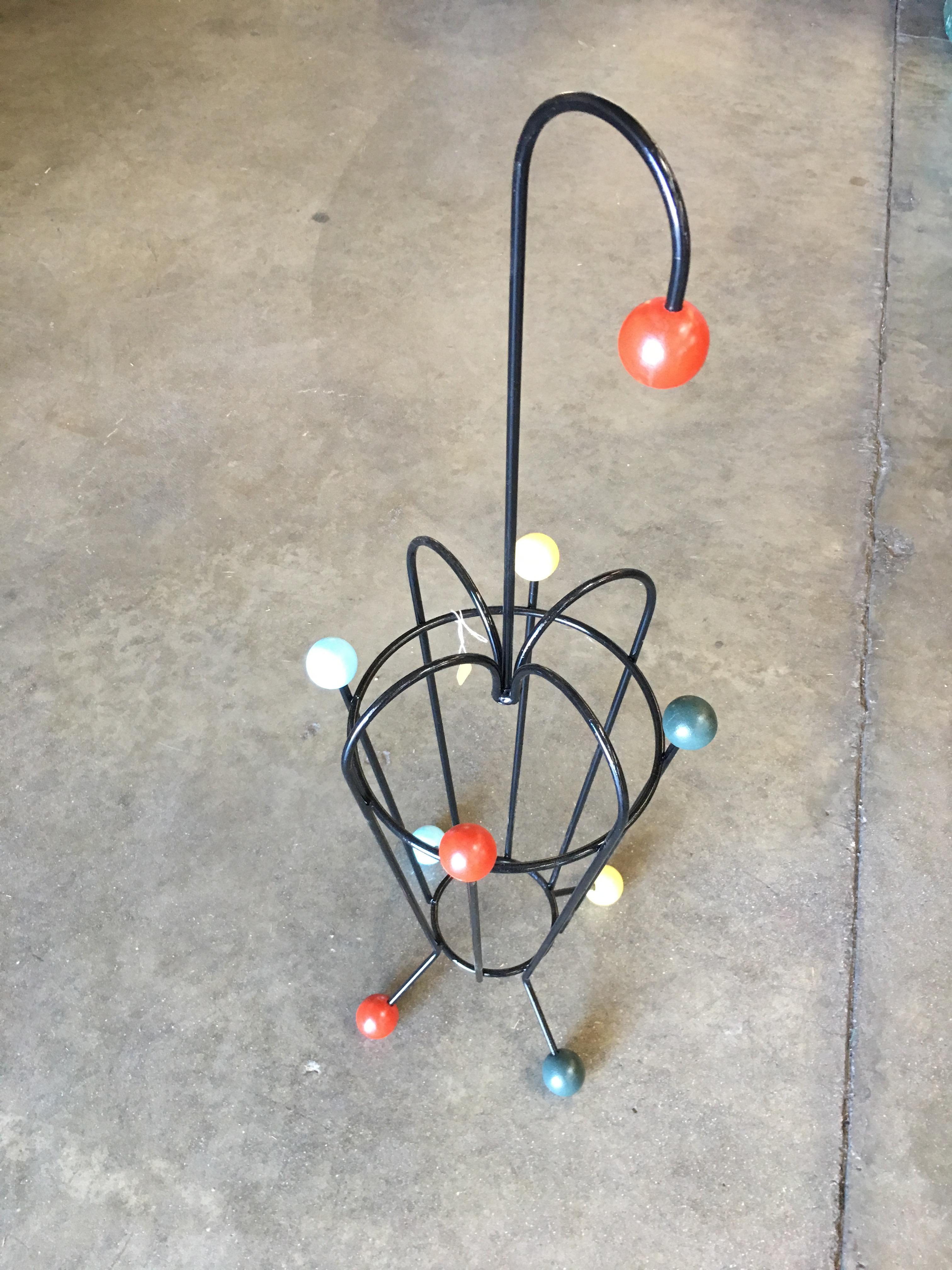 George Nelson inspired iron wire umbrella stand fashioned after the 1948 Vitra Ball Clock designed by Nelson himself.